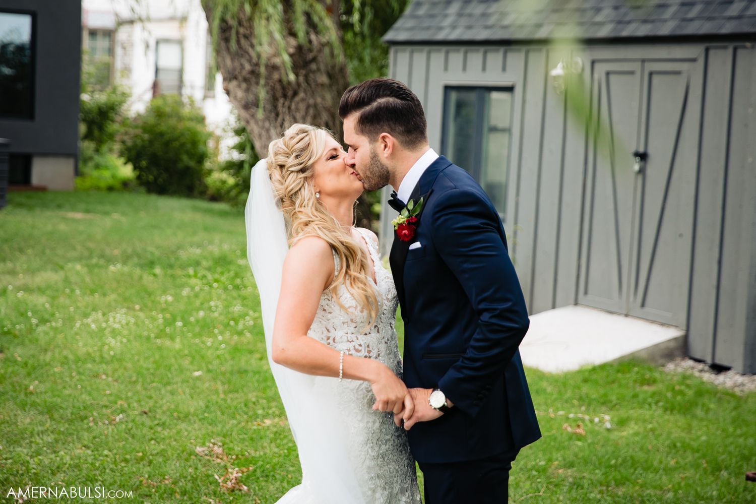 Romantic first dance moment between newlyweds on their wedding day outdoors.