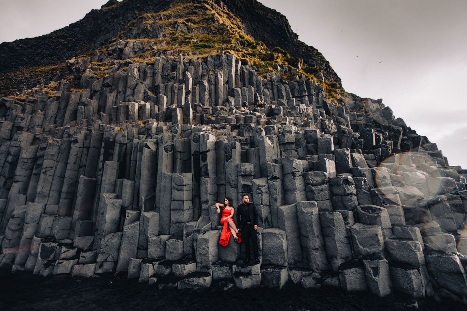 Dramatic basalt column formations along Iceland's black rocky coastline.