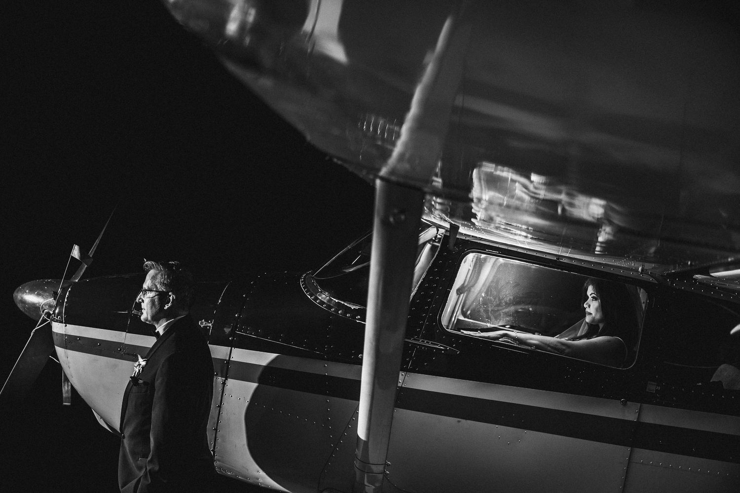 Dramatic black and white nighttime boat photography.