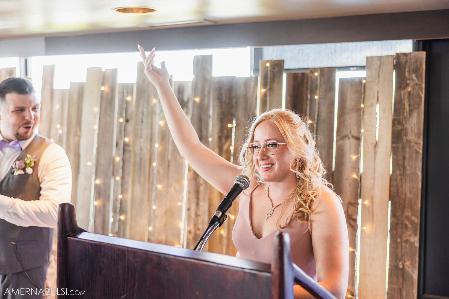 A person gives an emotional speech during a wedding reception celebration.