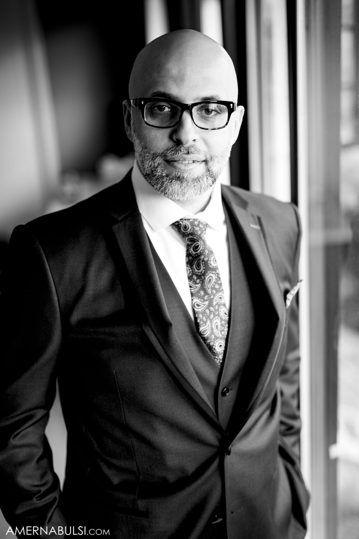 Black and white portraits showing details of formal attire and accessories.