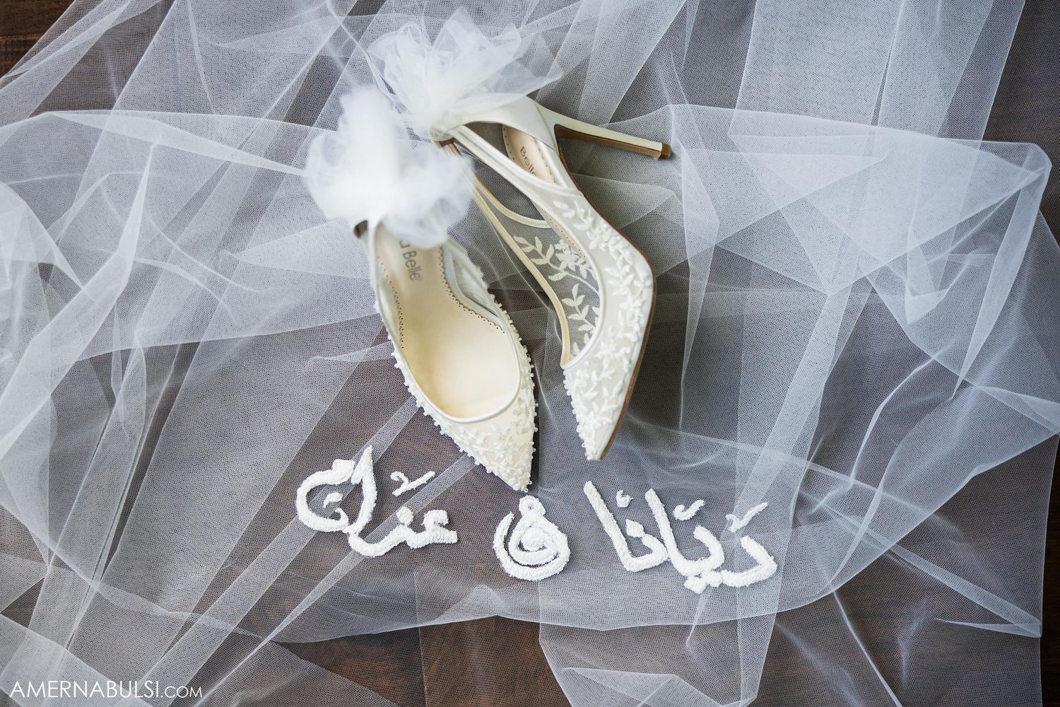 White lace wedding shoes with veil and Arabic calligraphy text overlay.