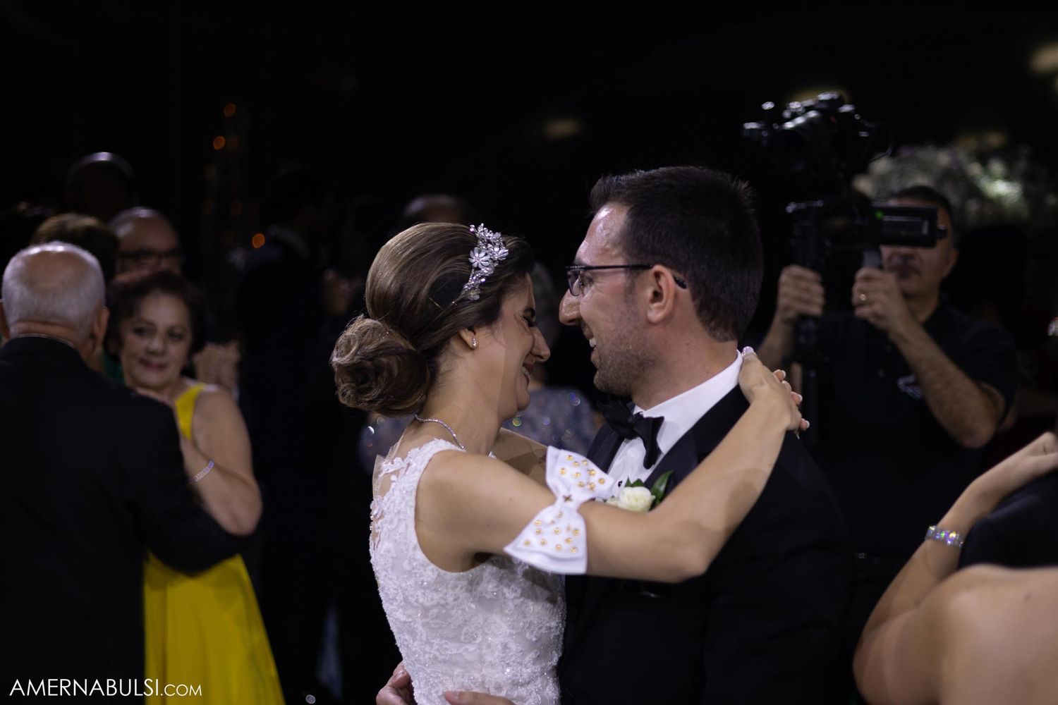 Candid wedding dance photo capturing an intimate moment between the newlyweds.