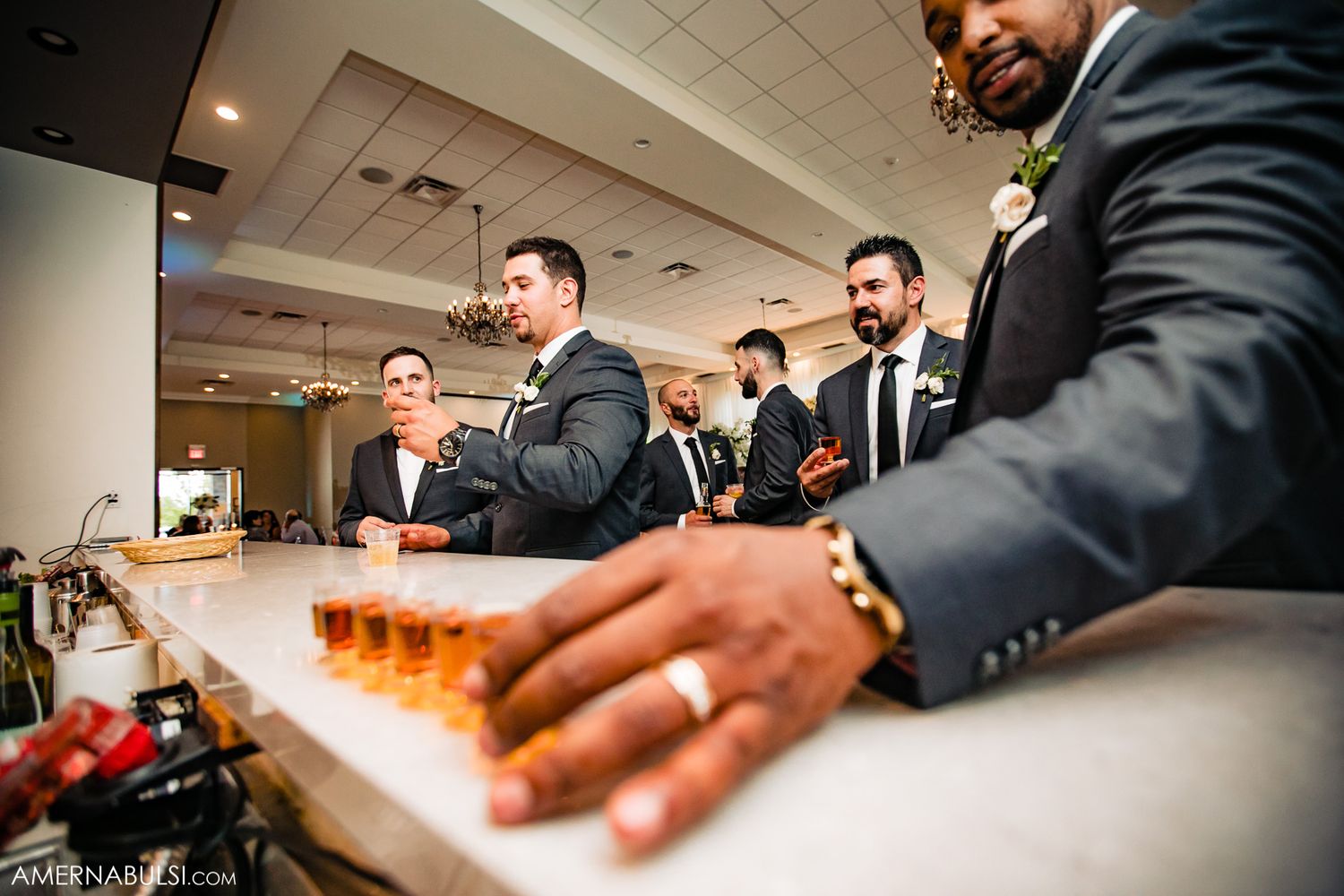 Professional catering staff preparing gourmet dishes at an elegant event.