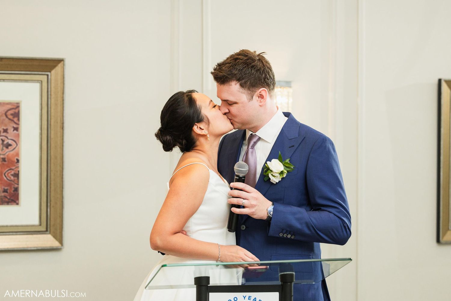 Intimate moment shared between couple during wedding celebration.