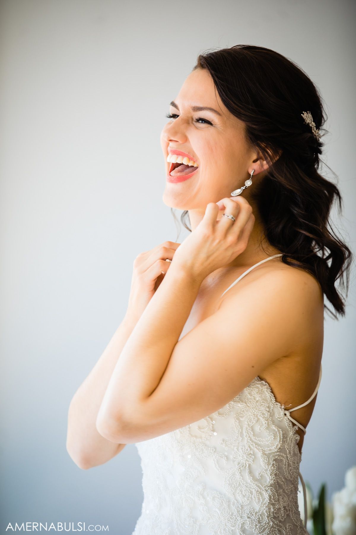 A series of joyful portraits showing a bride in a white lace dress expressing genuine happiness and emotion.