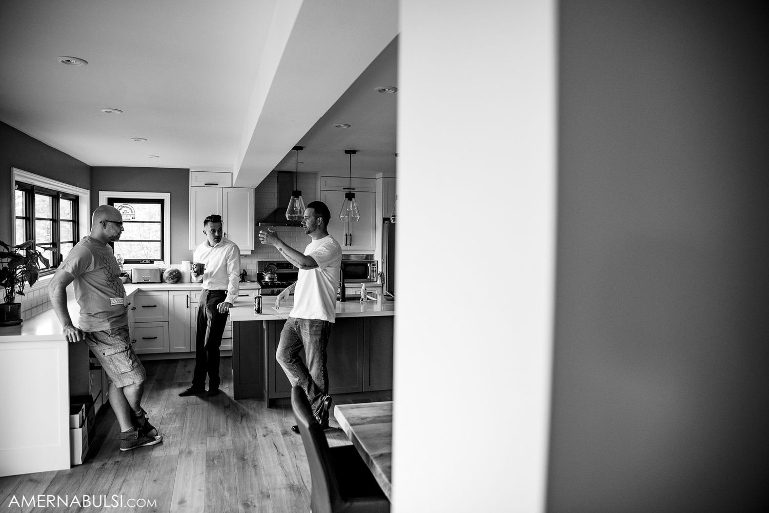 Black and white wedding photography sequence showing preparations and candid moments in a bridal suite.