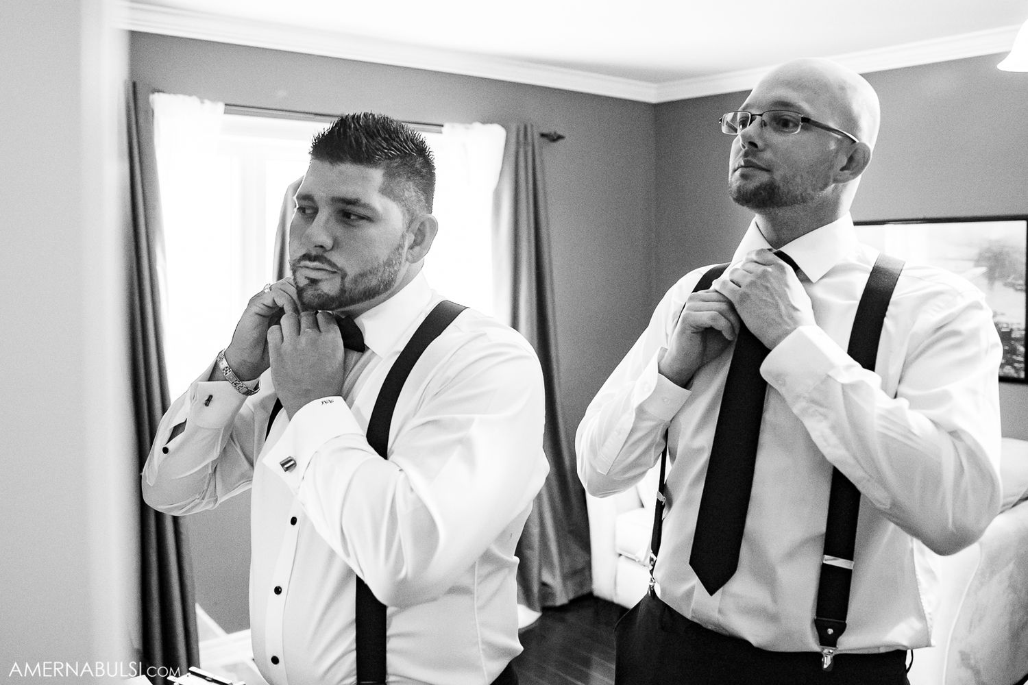 A series of black and white photos showing someone adjusting a bowtie and suspenders while getting dressed.
