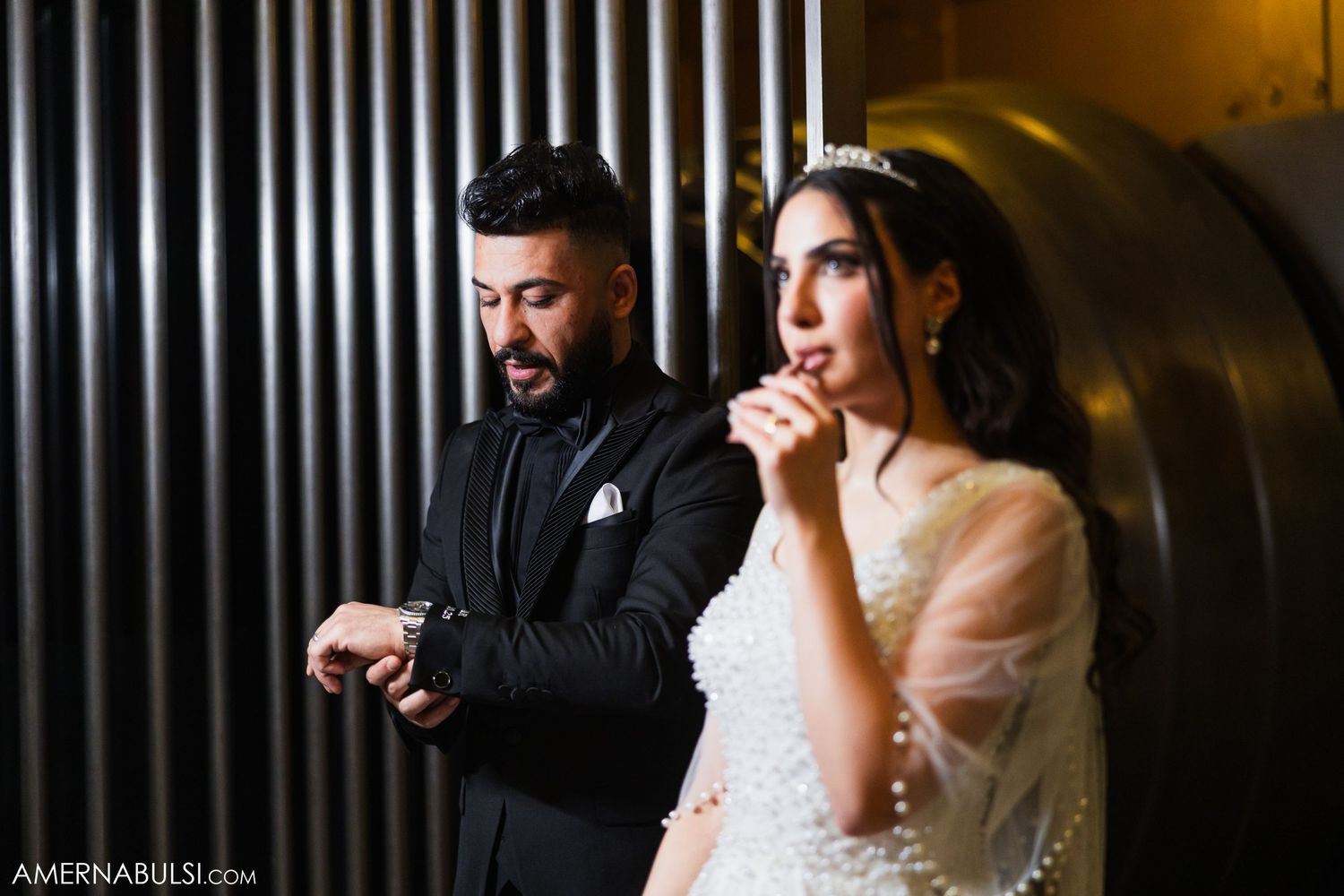 Dramatic black and white wedding photography sequence showing intimate moments in an industrial setting.