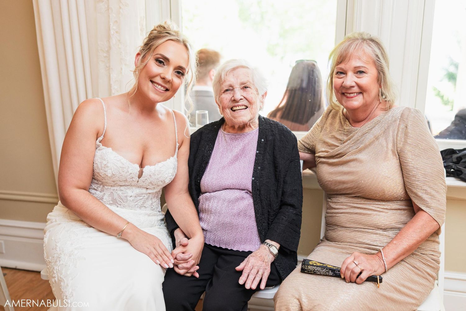 A heartwarming moment shared between generations at an elegant wedding celebration.