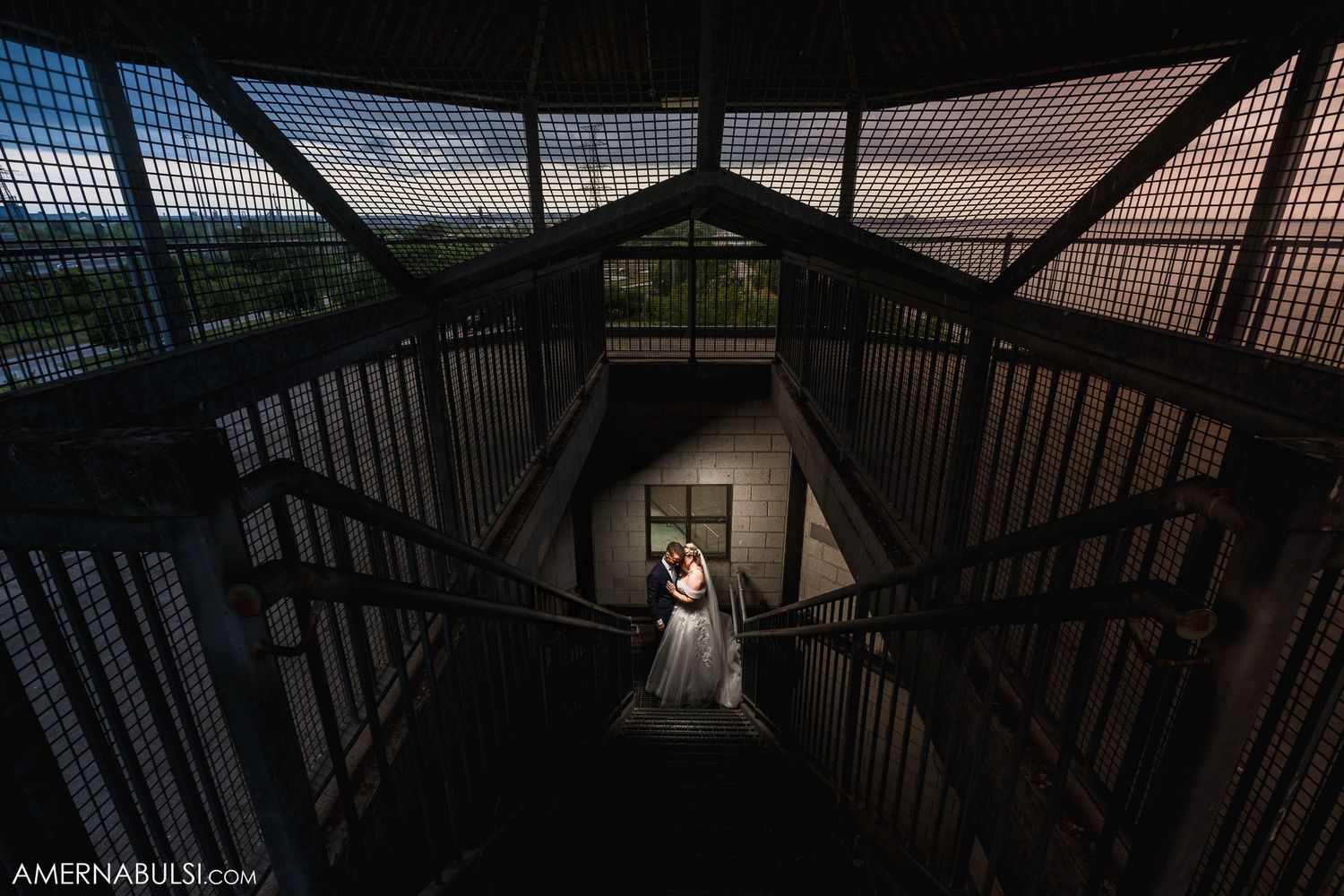 Modern architectural silhouette shots through geometric patterns and railings.