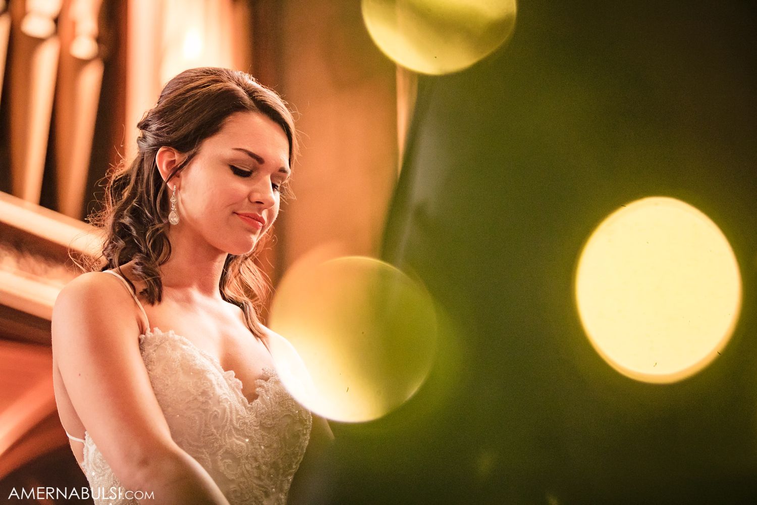 Artistic portrait with soft bokeh lights creating dreamy atmosphere.