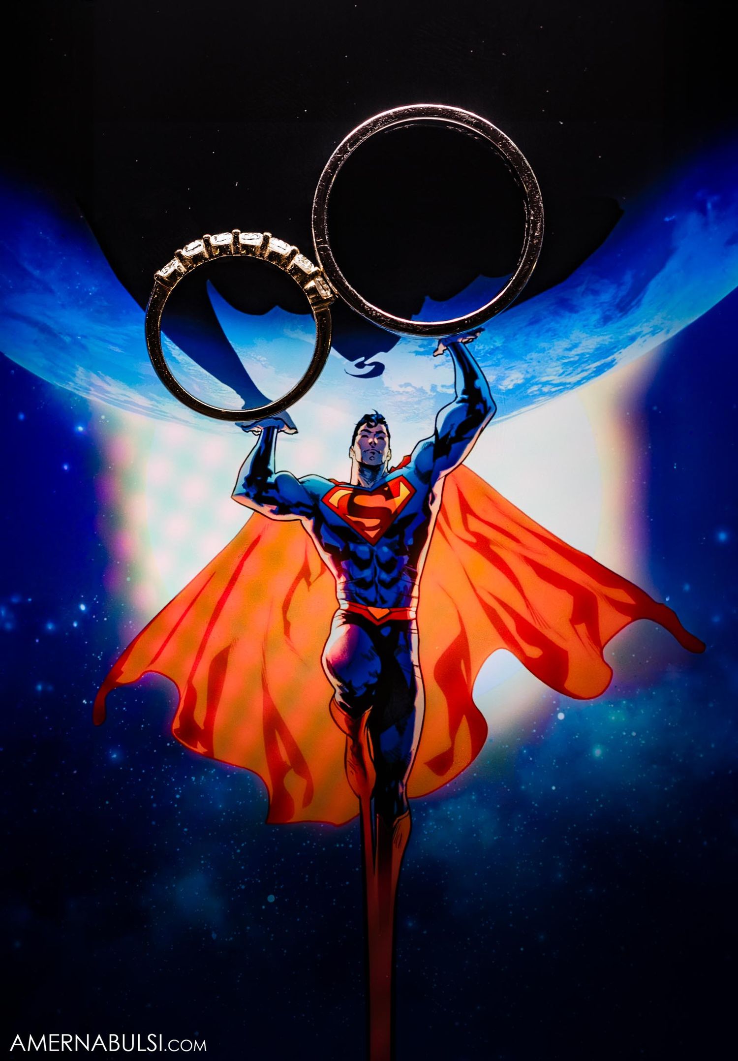 Creative wedding ring photo featuring Superman figure holding rings against blue cosmic background.