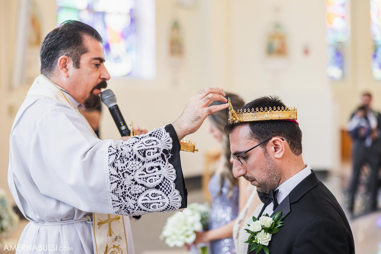Religious blessing being performed during traditional wedding ceremony.
