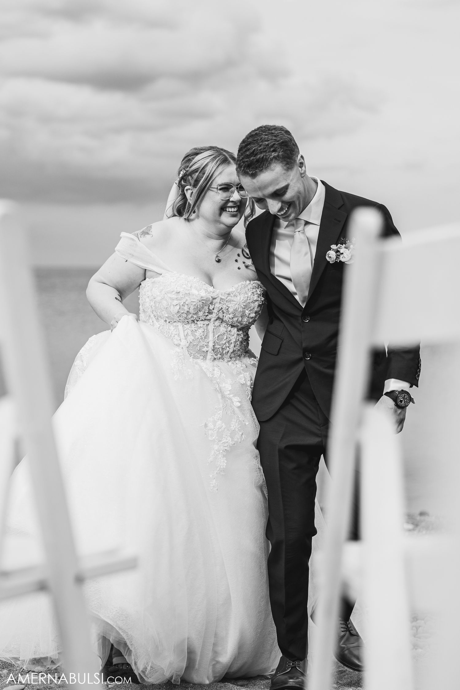 Black and white photo series of a romantic first dance at an elegant wedding reception.