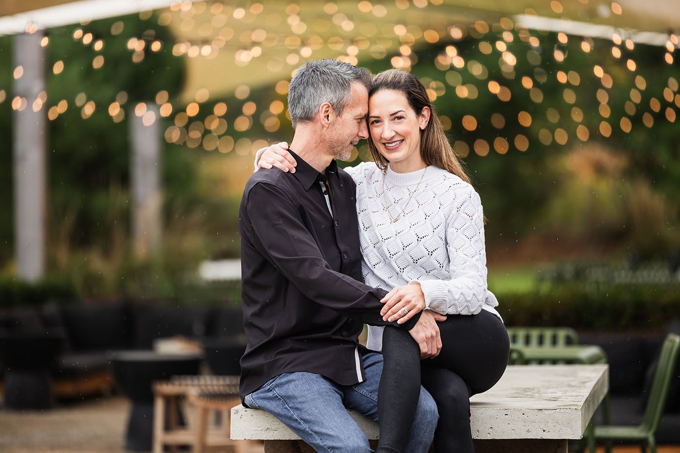 Romantic evening scene with string lights creating a warm ambiance.