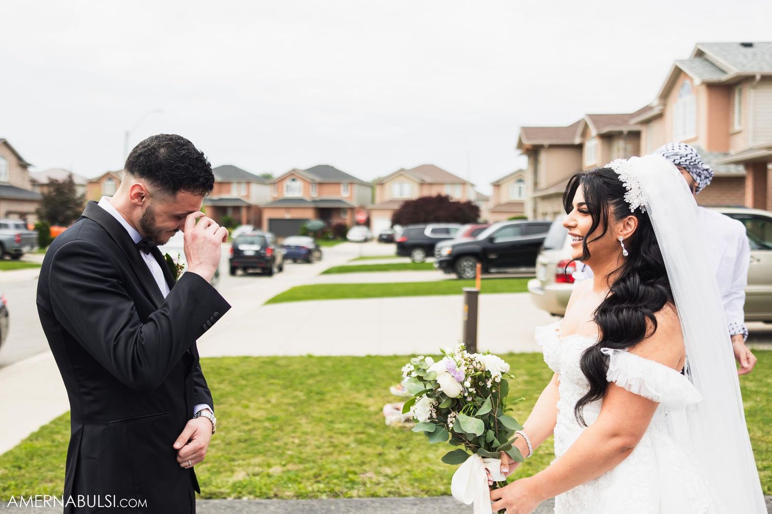 Couple shares tearful reactions during their wedding first look moment.