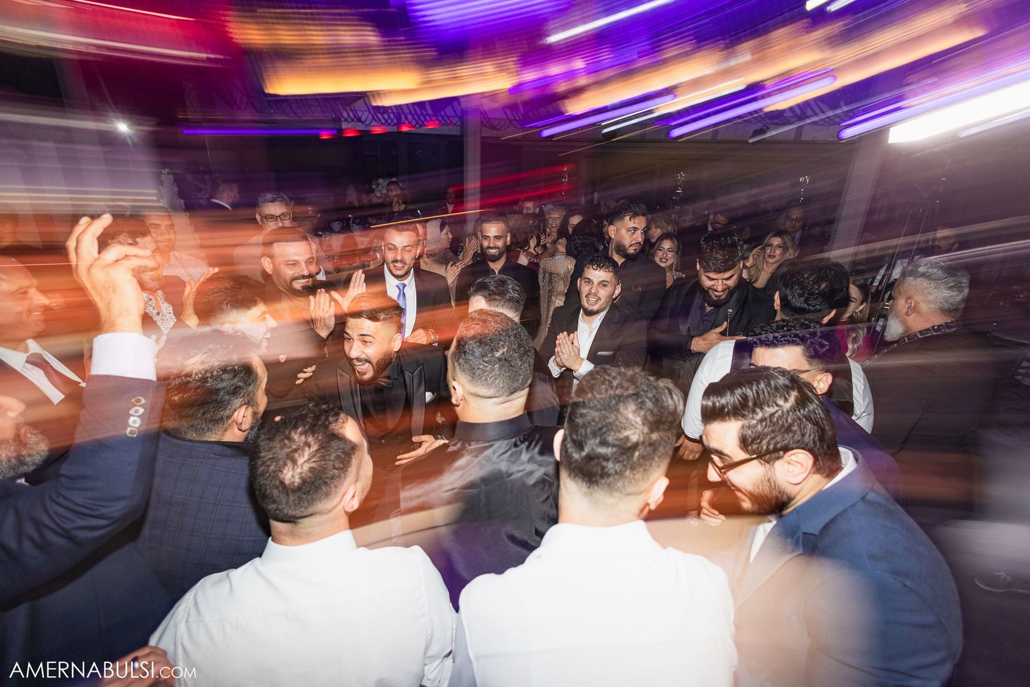 Blurred motion shots of people dancing and celebrating at a nightclub with purple and orange lighting effects.