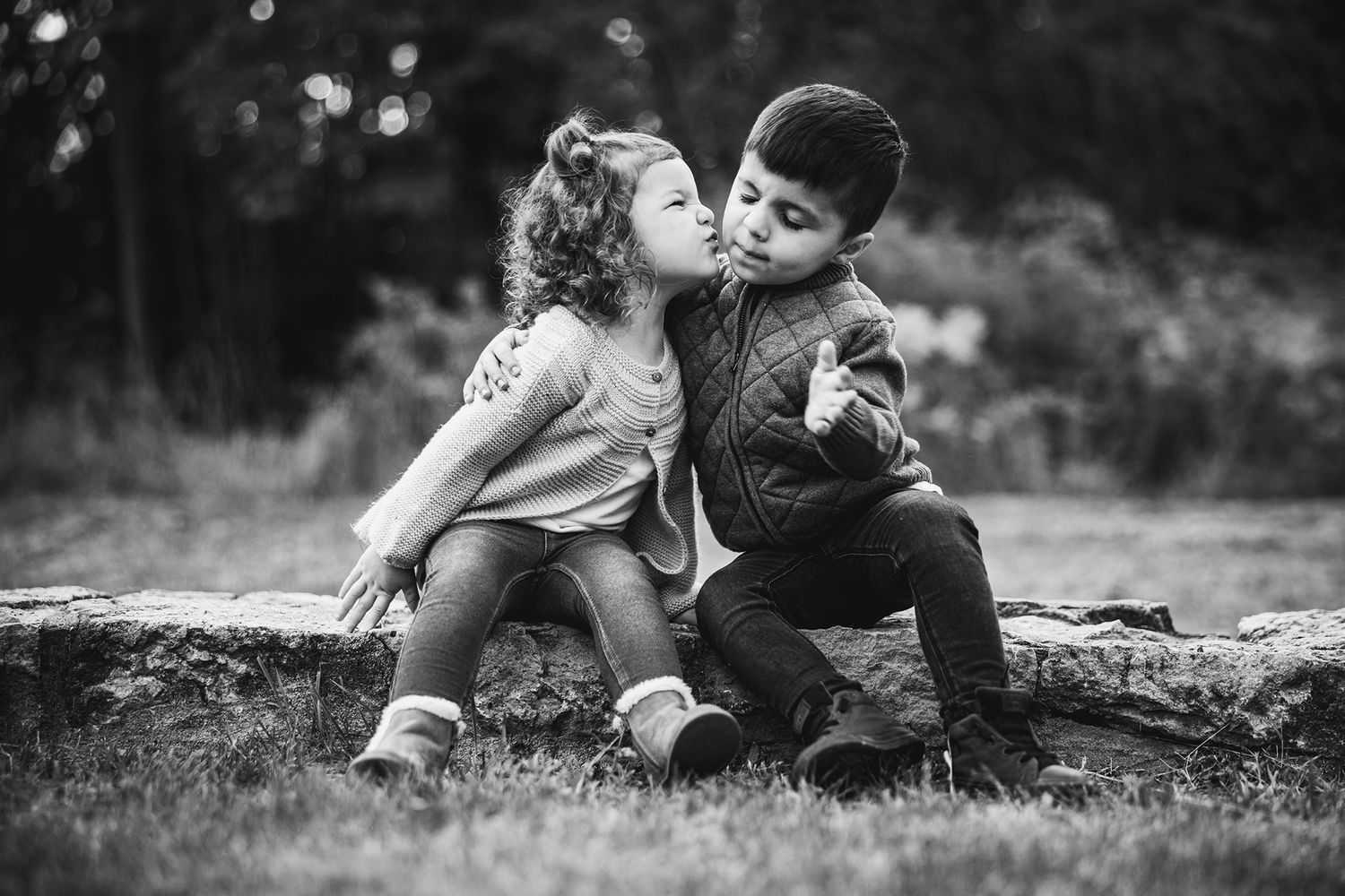 Black and white intimate family photos showing tender moments together.