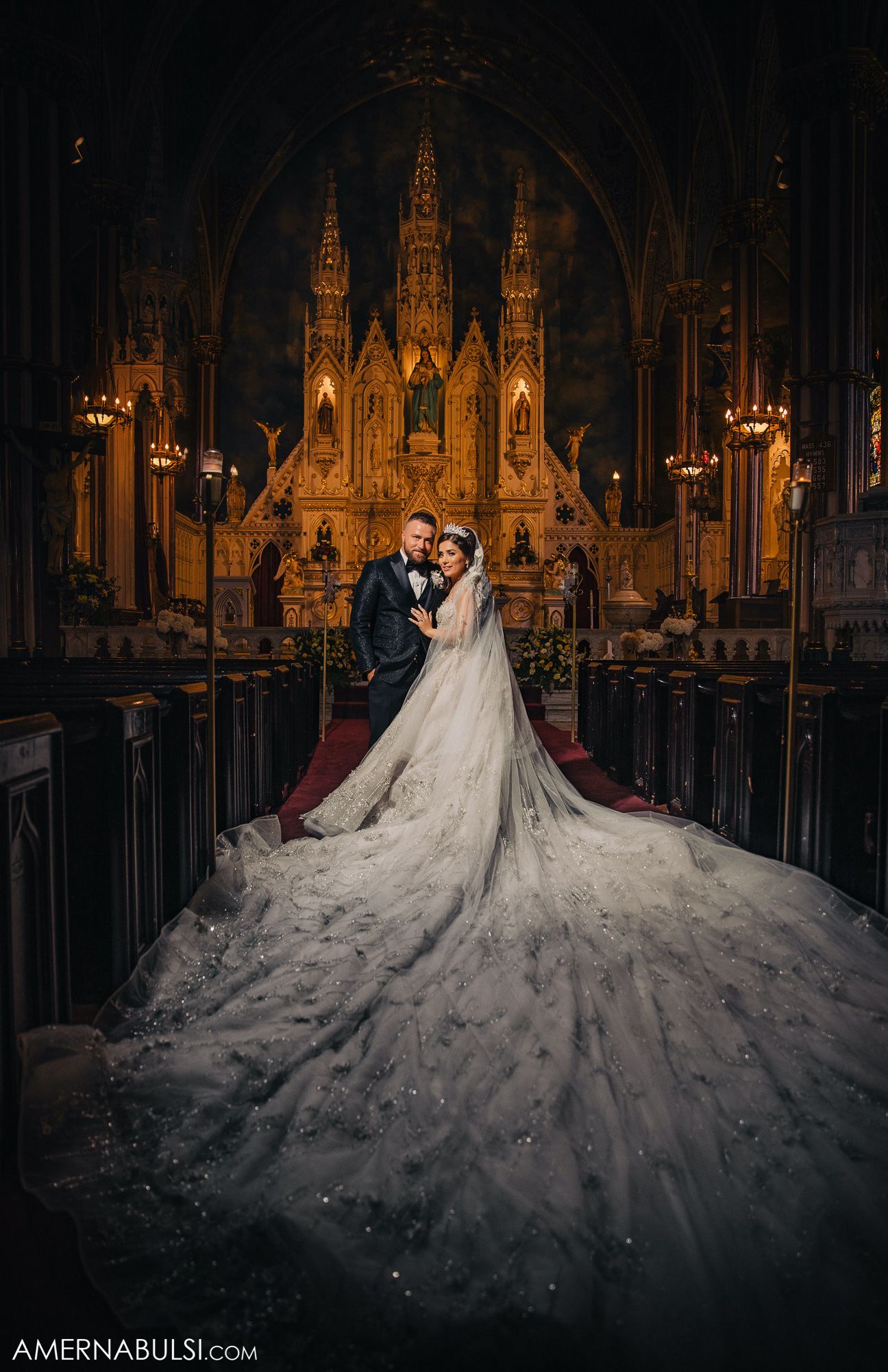 Ornate gothic cathedral interior with dramatic lighting and grand architectural details.