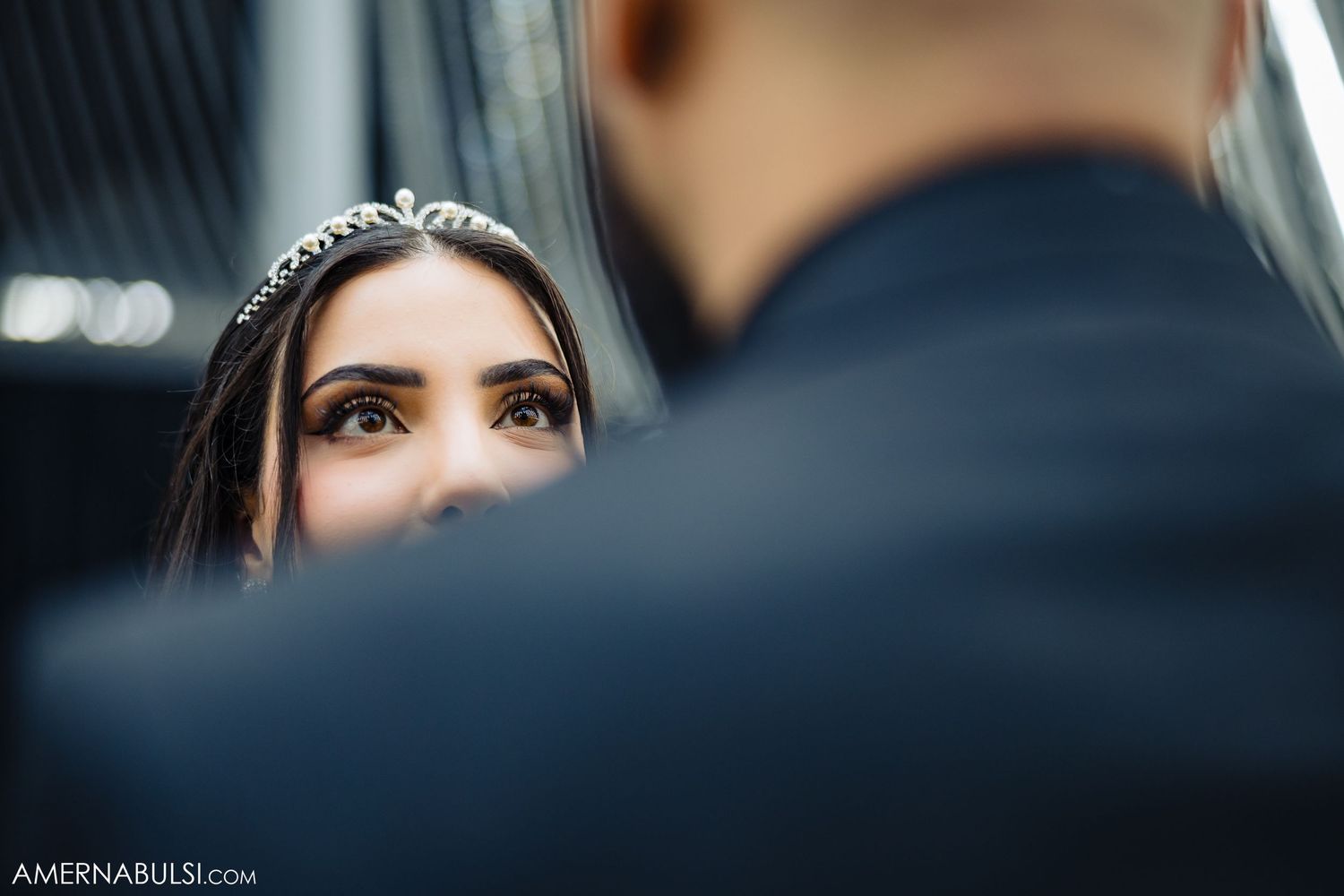 Artistic black and white wedding photography series capturing tender moments between a couple.