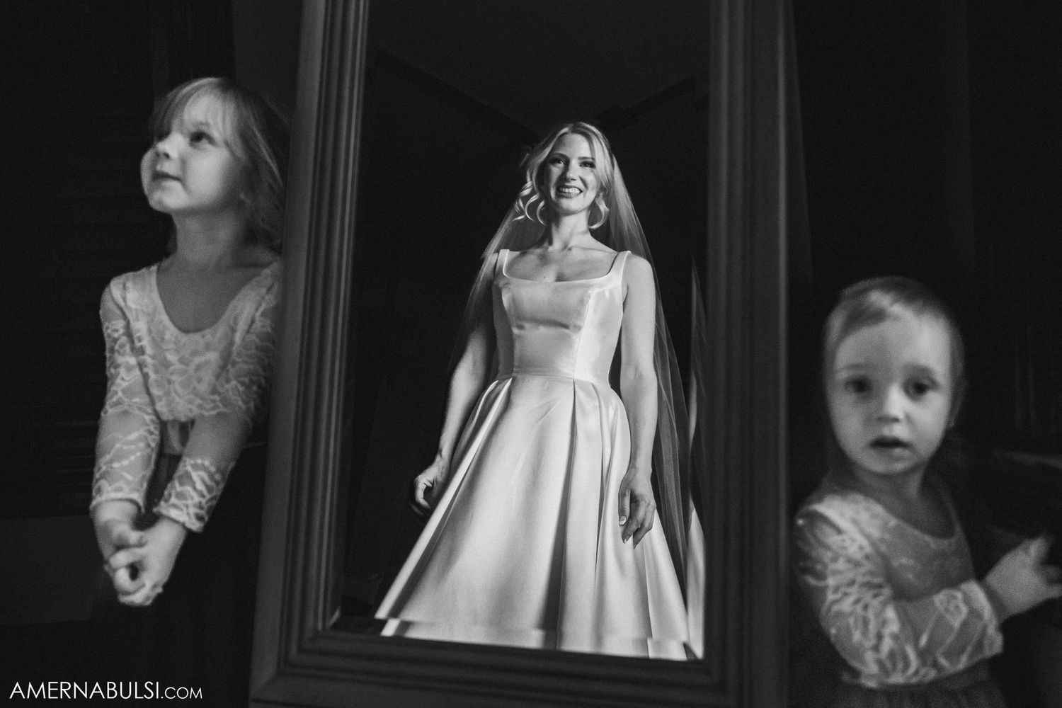 An artistic black and white photograph showing reflections in mirrors.