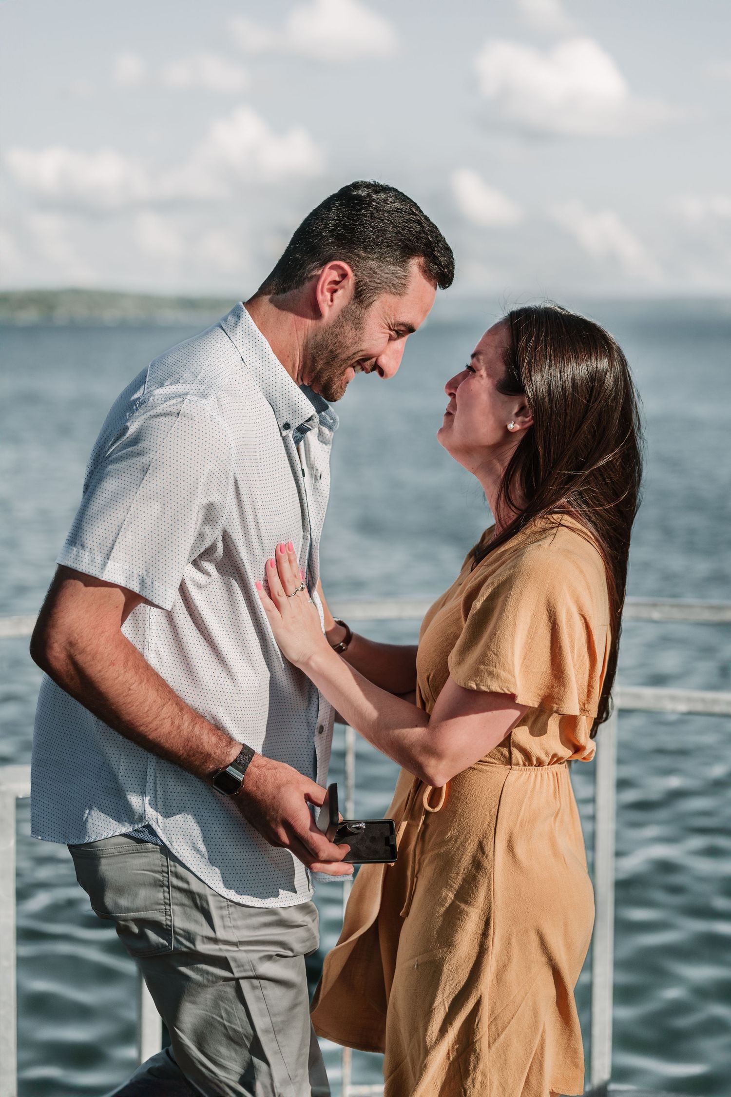 A surprise waterfront proposal captured in sequence showing emotional reactions.