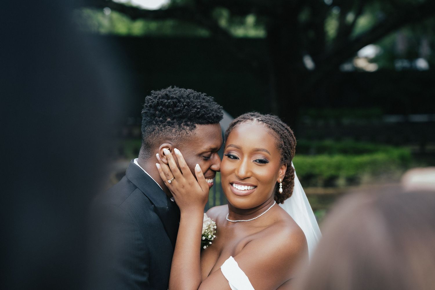 Romantic outdoor wedding photography session with intimate poses and natural lighting.