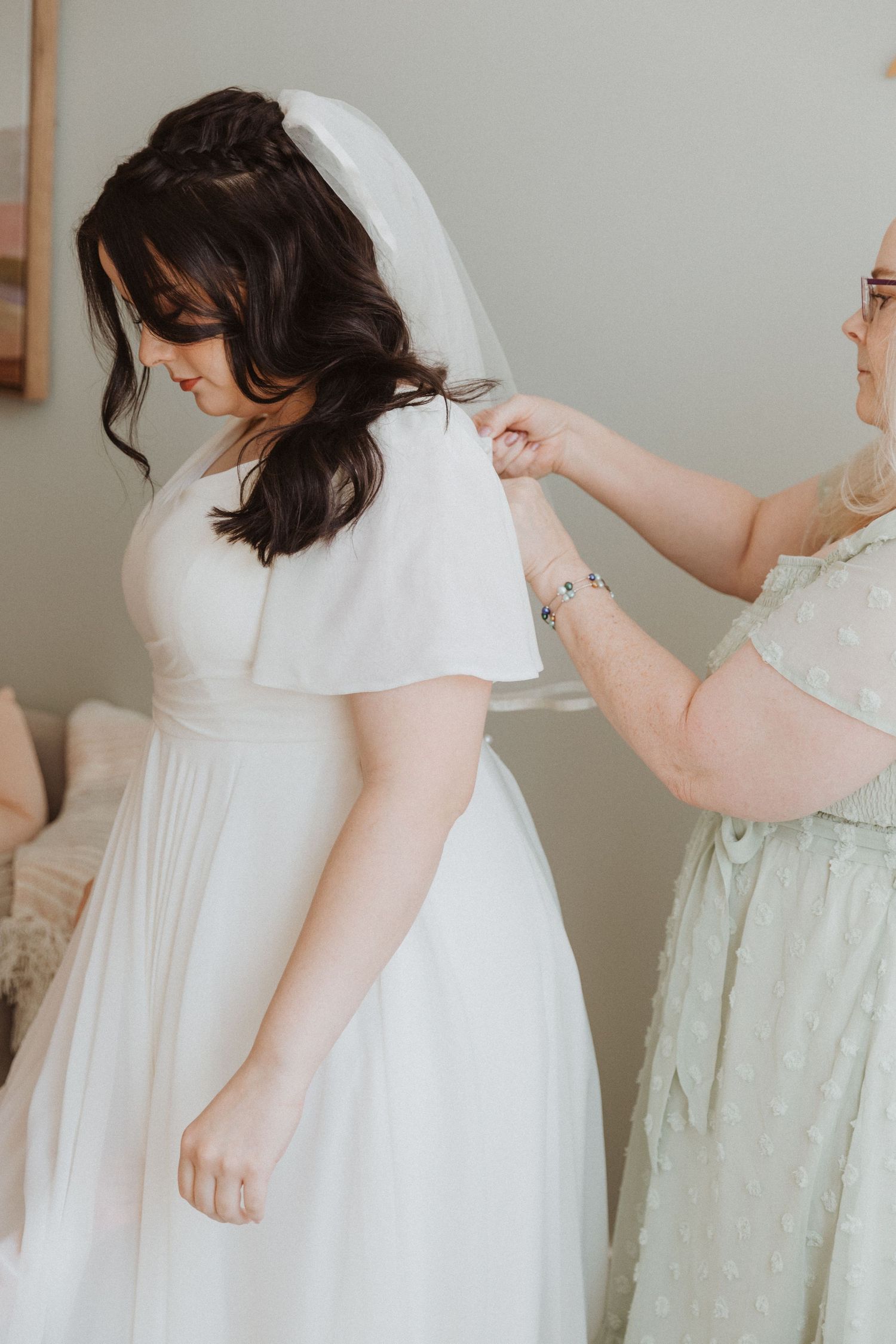 Utah County Wedding Bride Getting Wedding dress on and married at The studio Draper in Salt Lake City County