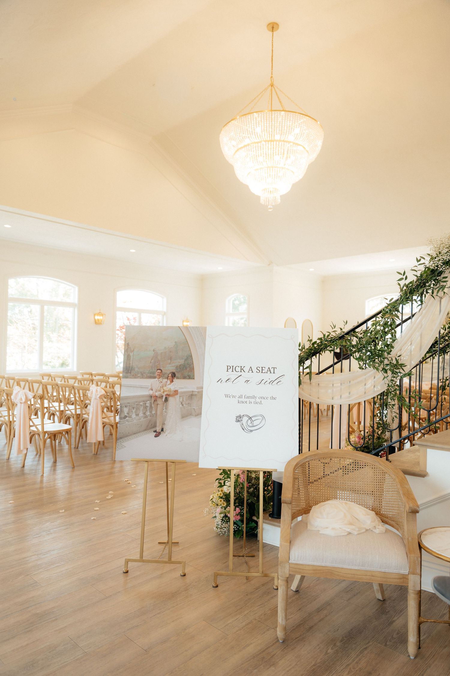 Elegant wedding venue foyer with crystal chandelier, 