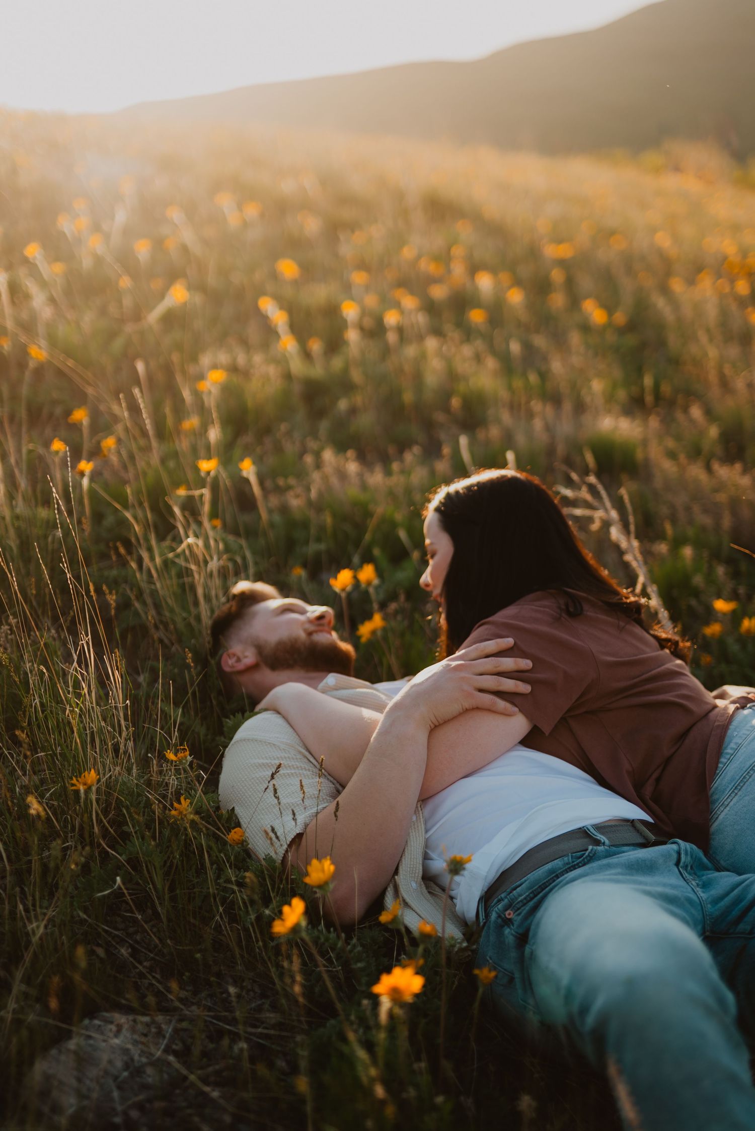Cinematic Utah wedding photography capturing timeless moments and genuine emotion in a field in provo with wildflowers
