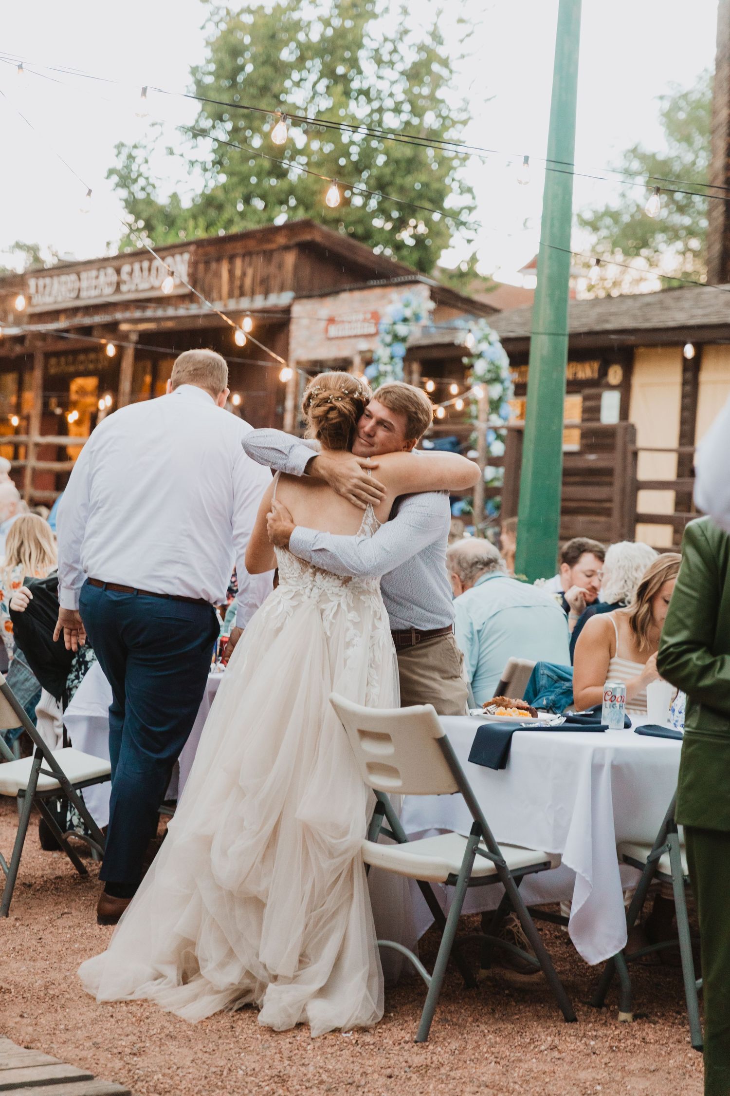 Bride and friends dance at wedding reception in Colorado