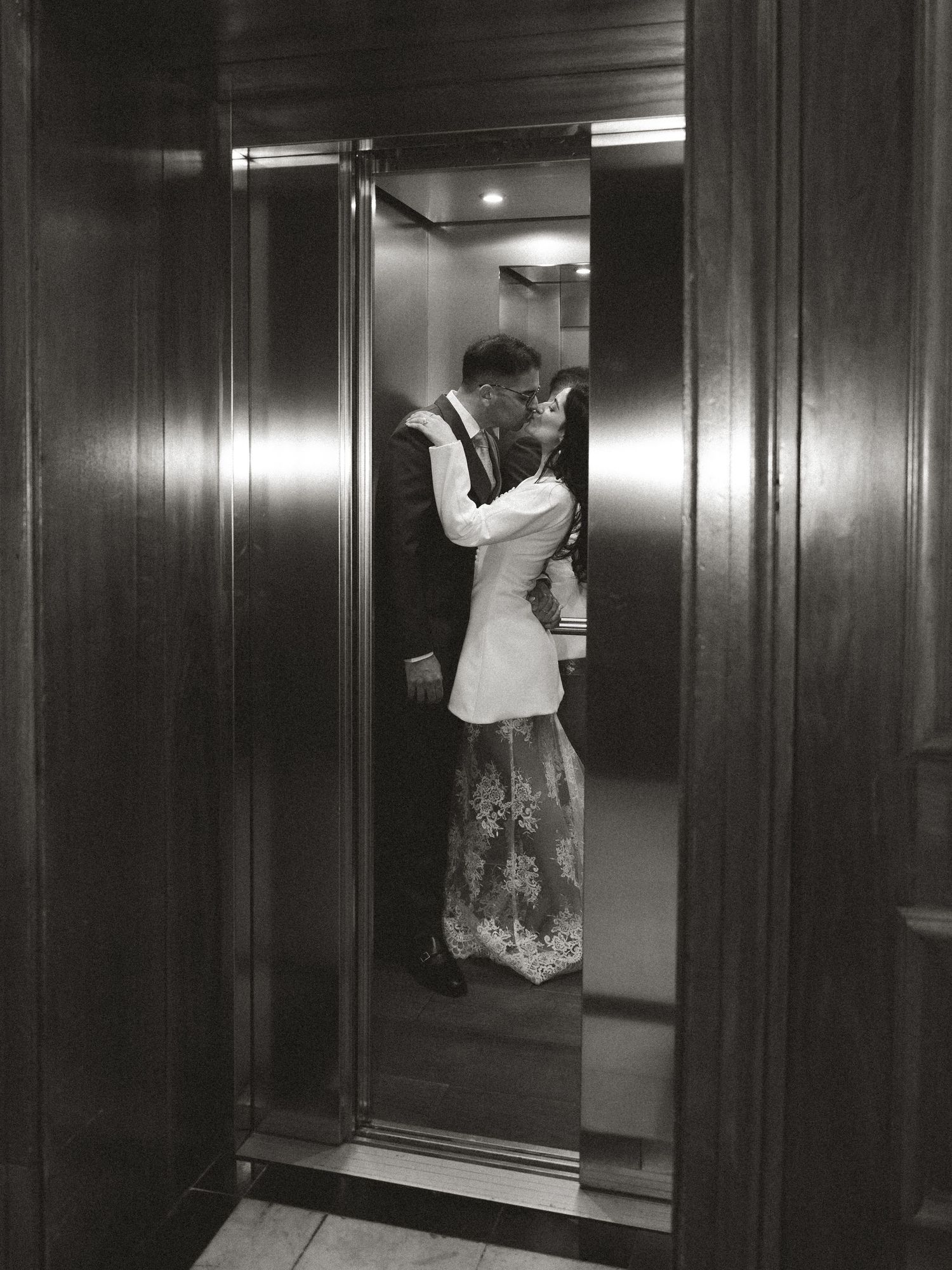 Sequence showing couple's playful interactions in a dark wood-paneled corridor.