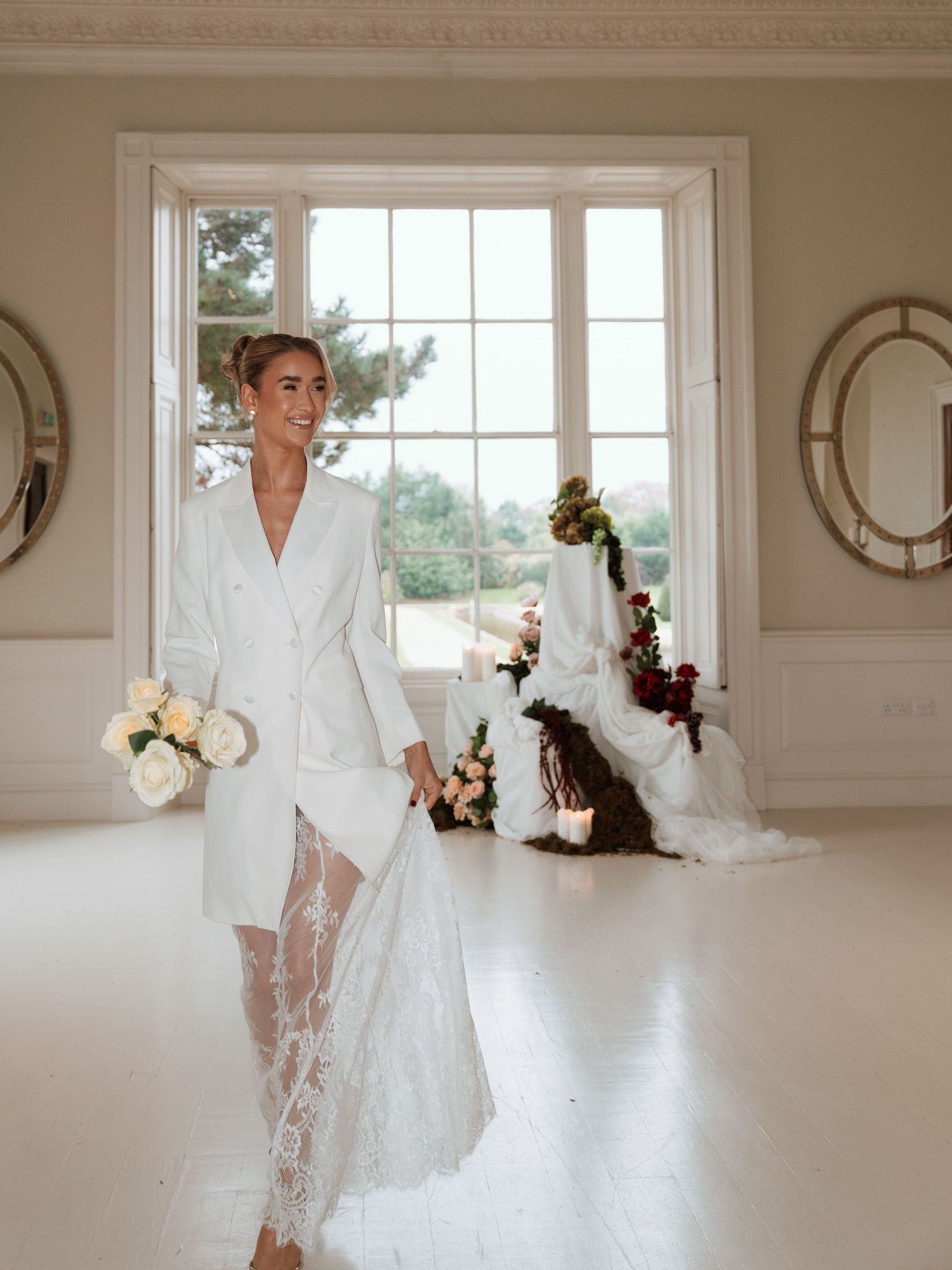 Wedding preparation scene in an elegant room with white lace and floral details.