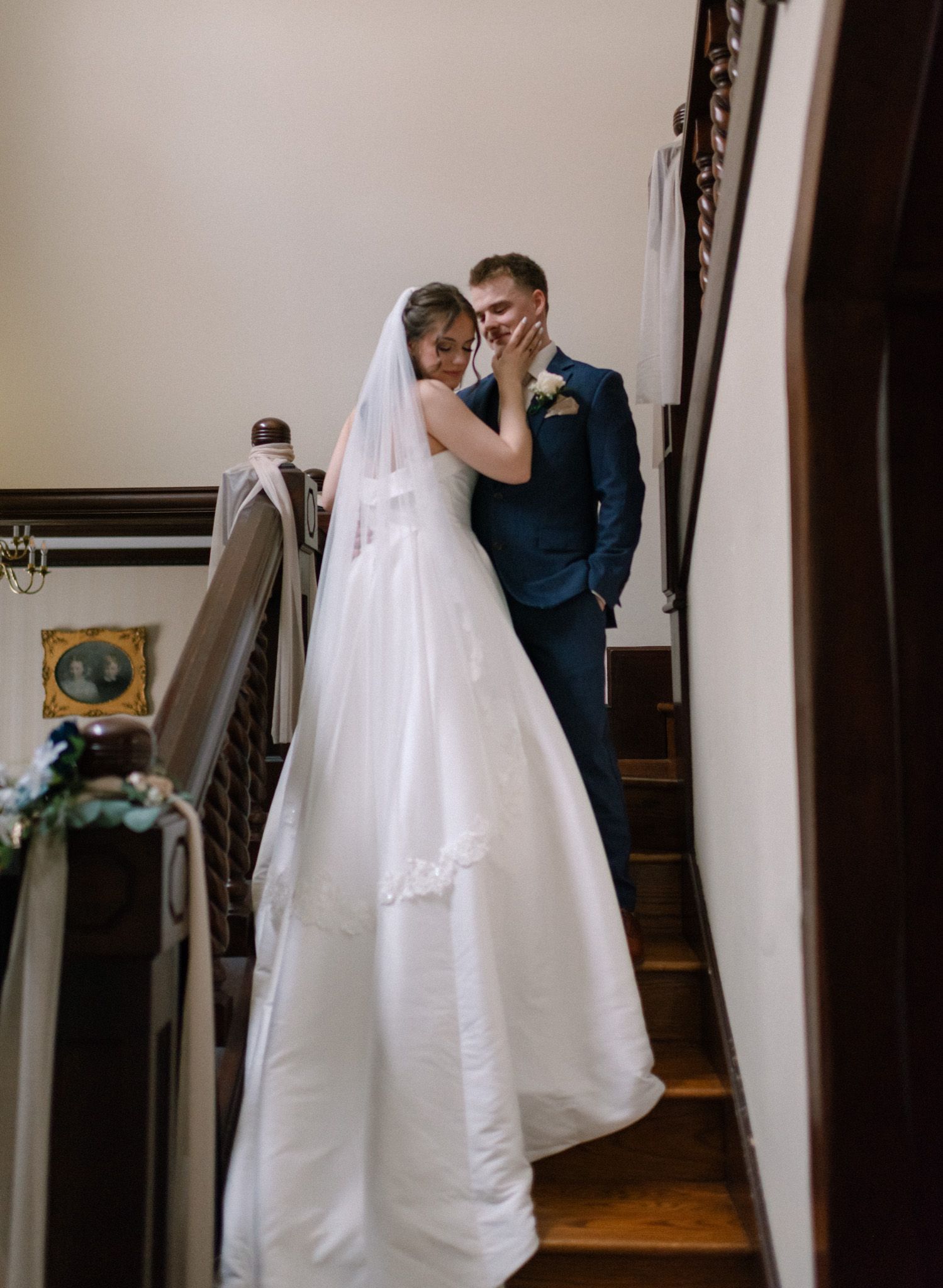 Intimate moment between bride and groom at their wedding at Huffman Manor in Fairbanks, Alaska.