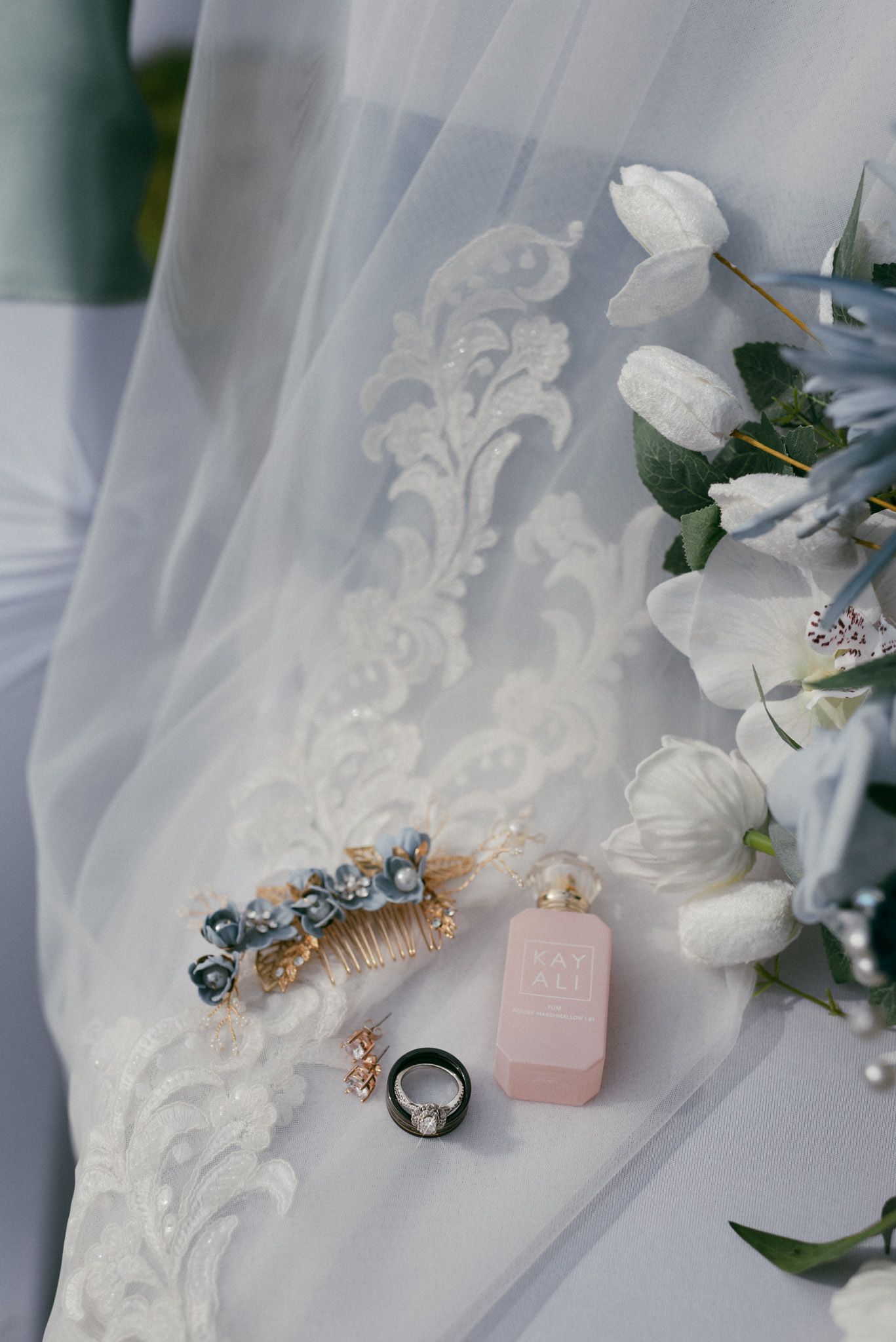 Elegant wedding details carefully displayed on a chair in the bride’s backyard in Fairbanks, Alaska.