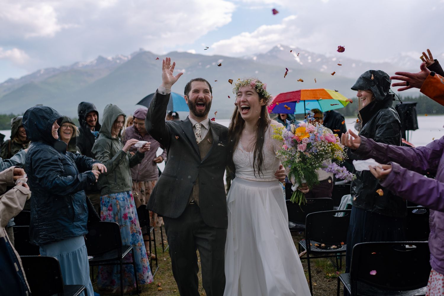 Bride and groom celebrating their Alaska wedding with friends and family near Denali National Park in Healy, Alaska.