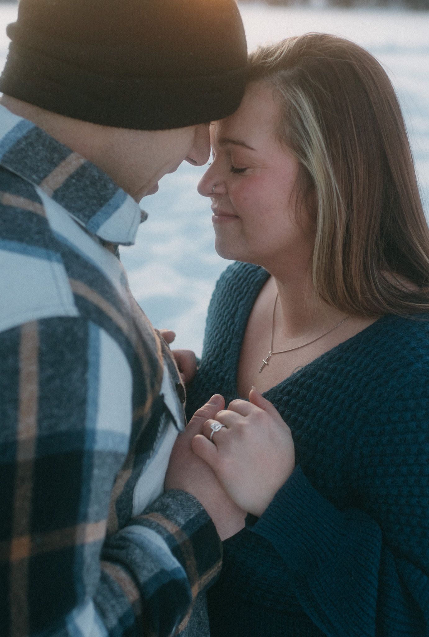 A couple embracing the winter magic during their proposal in Fairbanks, Alaska.