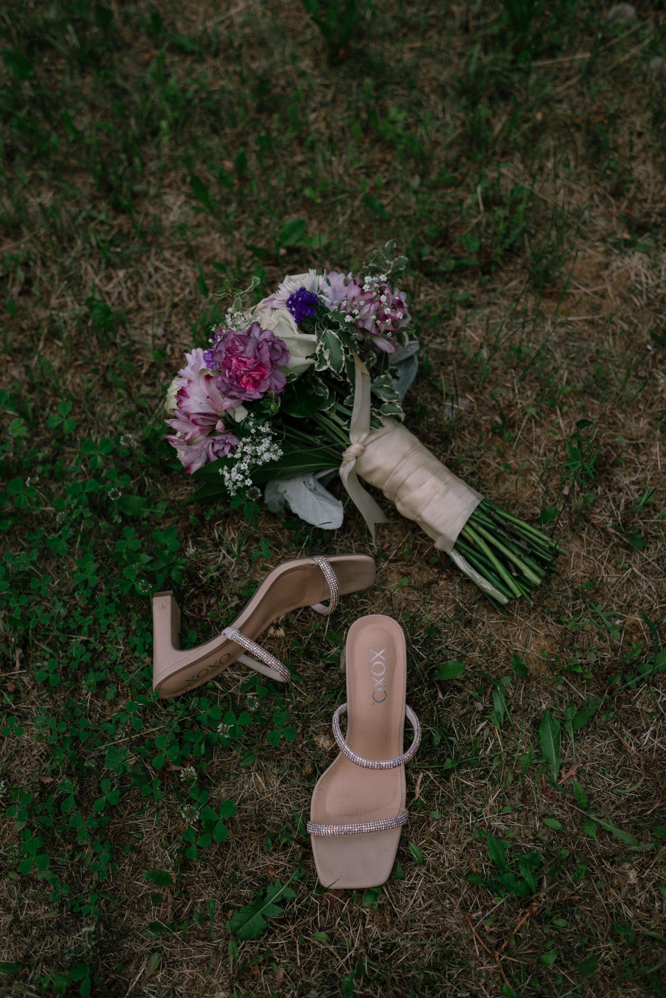 Bridal details including wedding shoes and bouquet from a Fairbanks, Alaska elopement, captured by an Alaska wedding photographer.