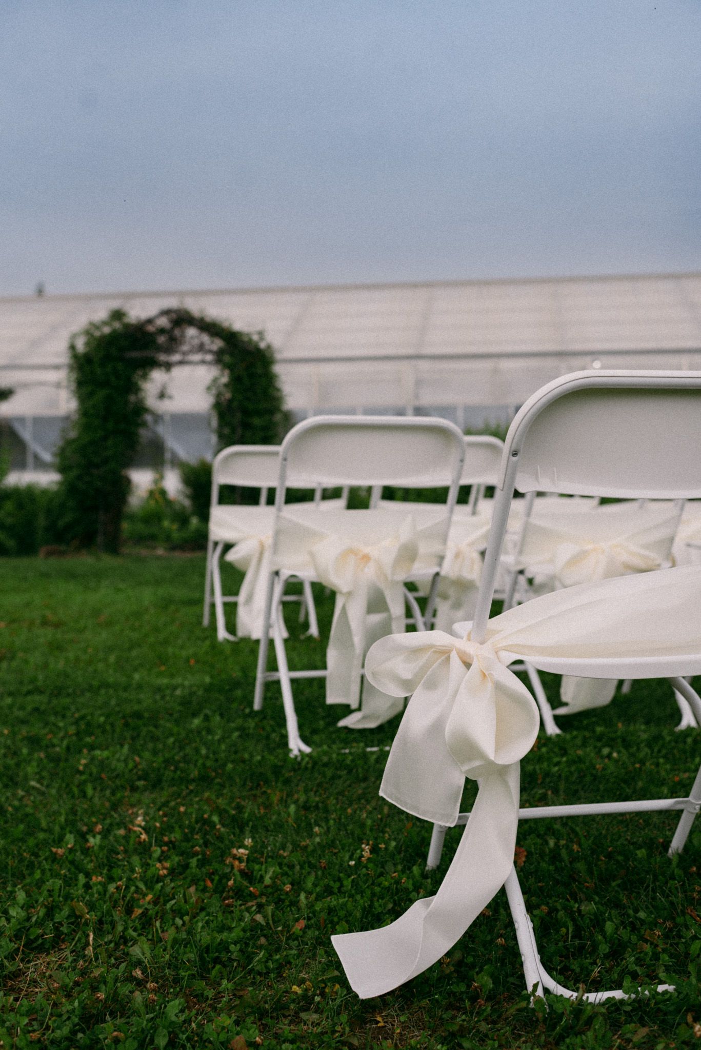 Intimate bride and groom wedding ceremony at The Plant Kingdom Greenhouse and Nursery in Fairbanks, Alaska.