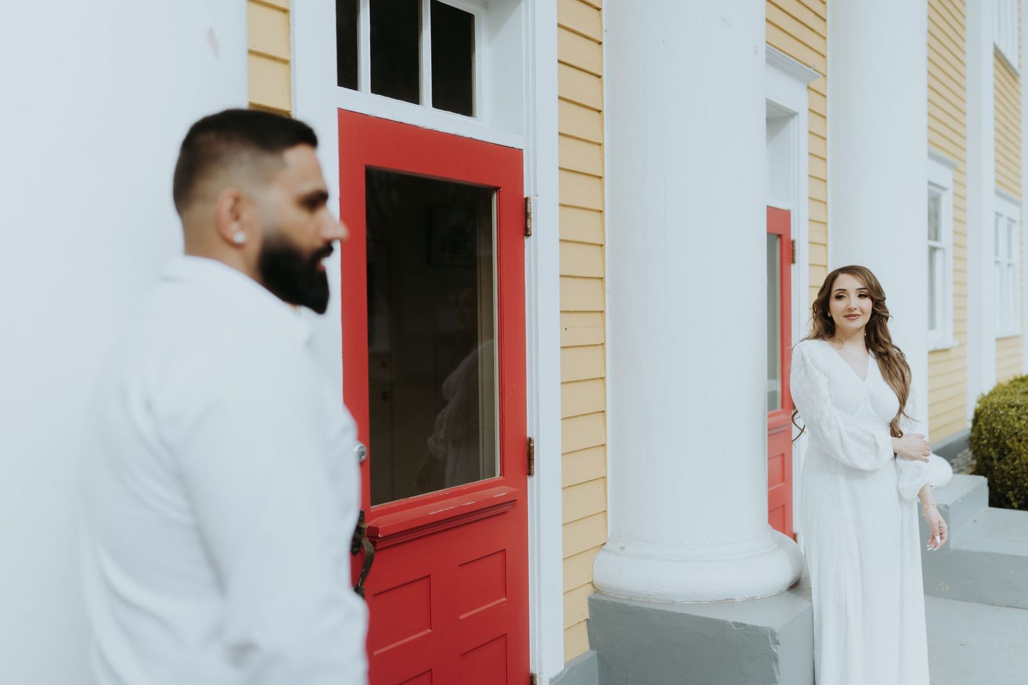 Series of photos showing interactions at a white building with bright red doors.