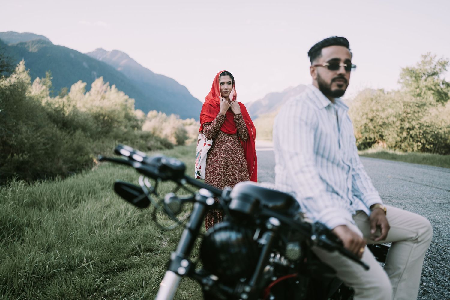 A series of scenic motorcycle photos showing riders on a mountain road with beautiful landscapes in the background.