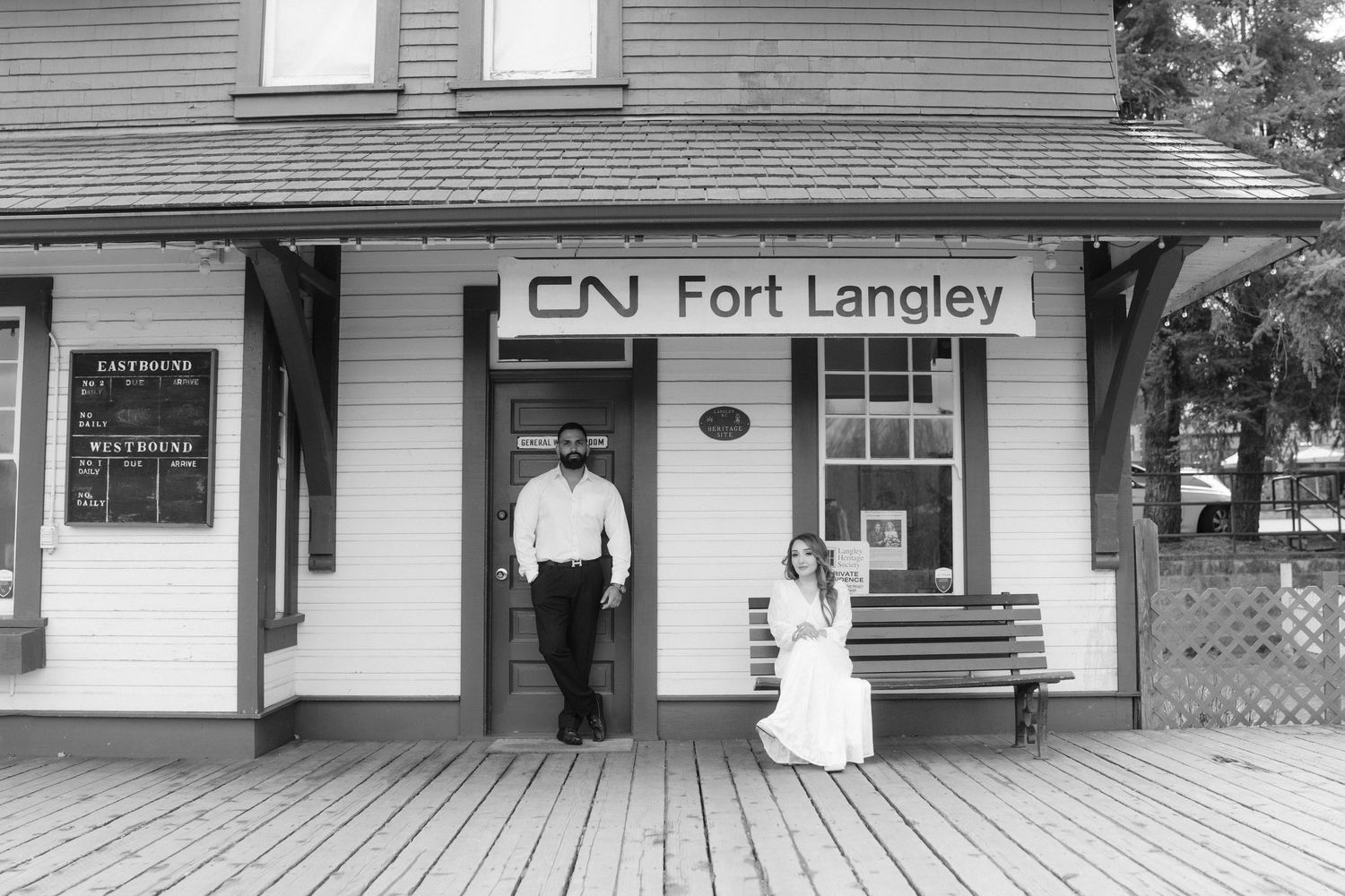 A series of exterior shots of the CN Fort Langley train station building with white siding and green trim.