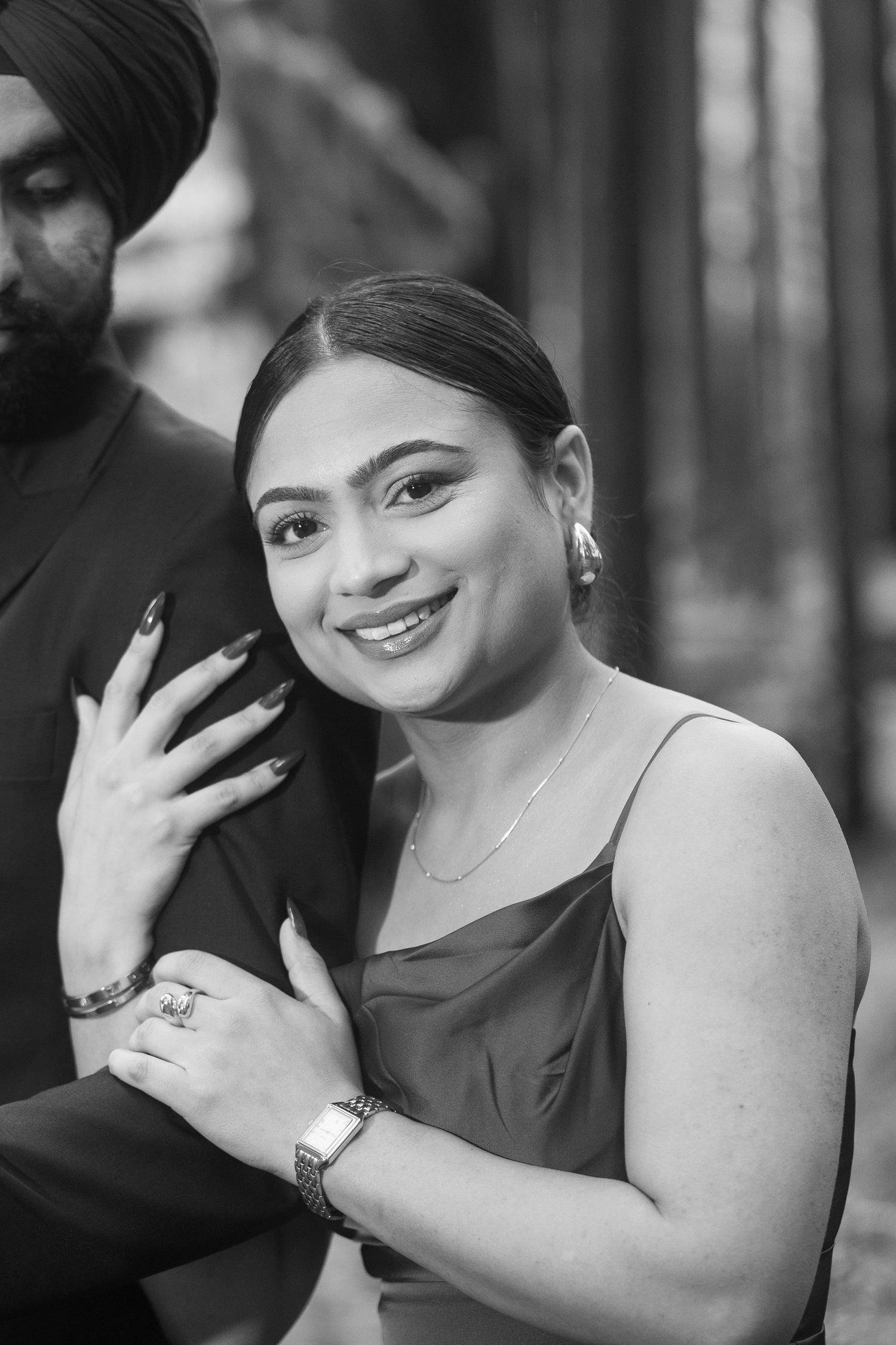Black and white portrait series showing joyful expressions and natural moments.