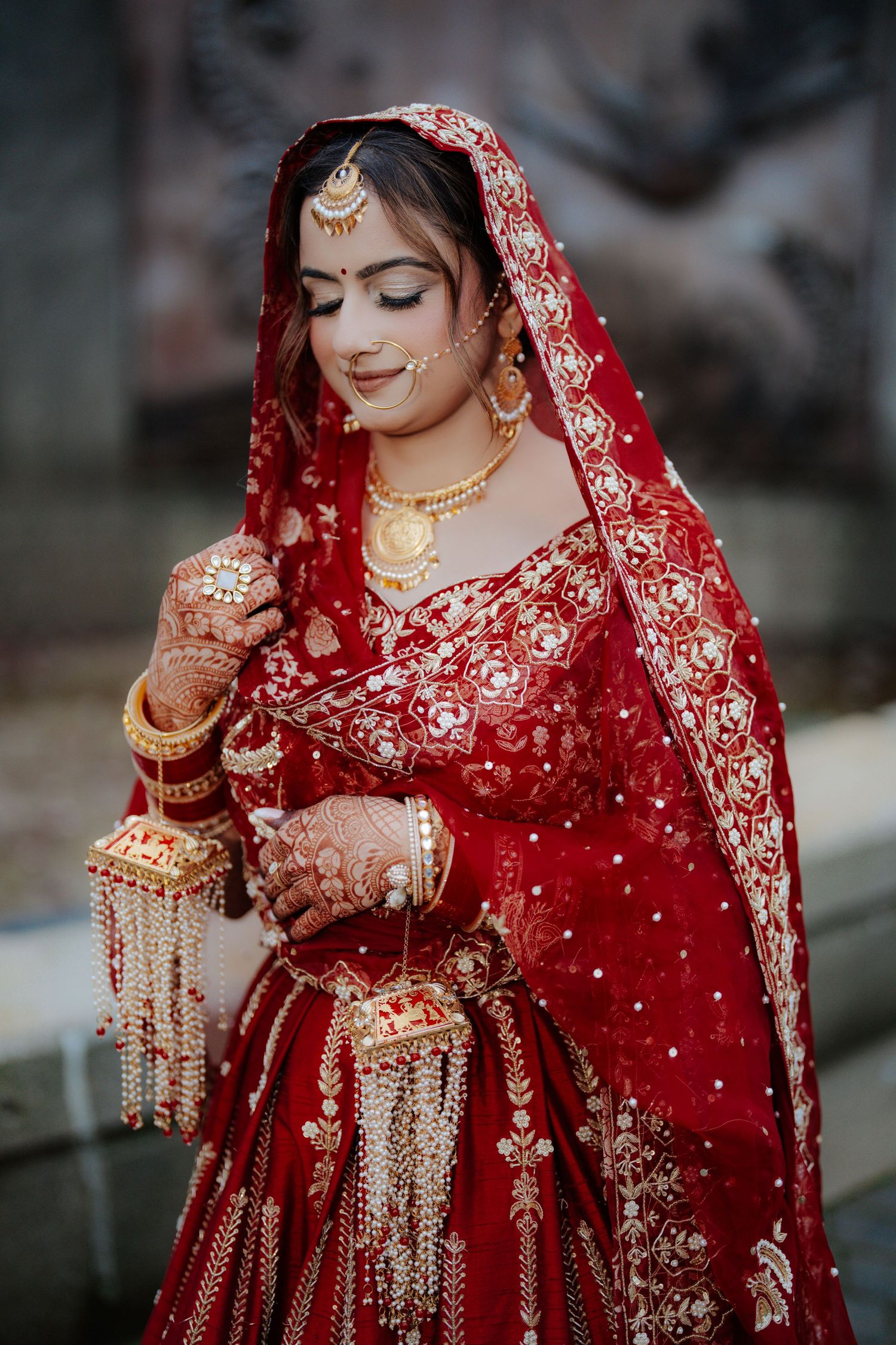 Close-up shots of traditional Indian bridal jewelry and red embroidered attire.