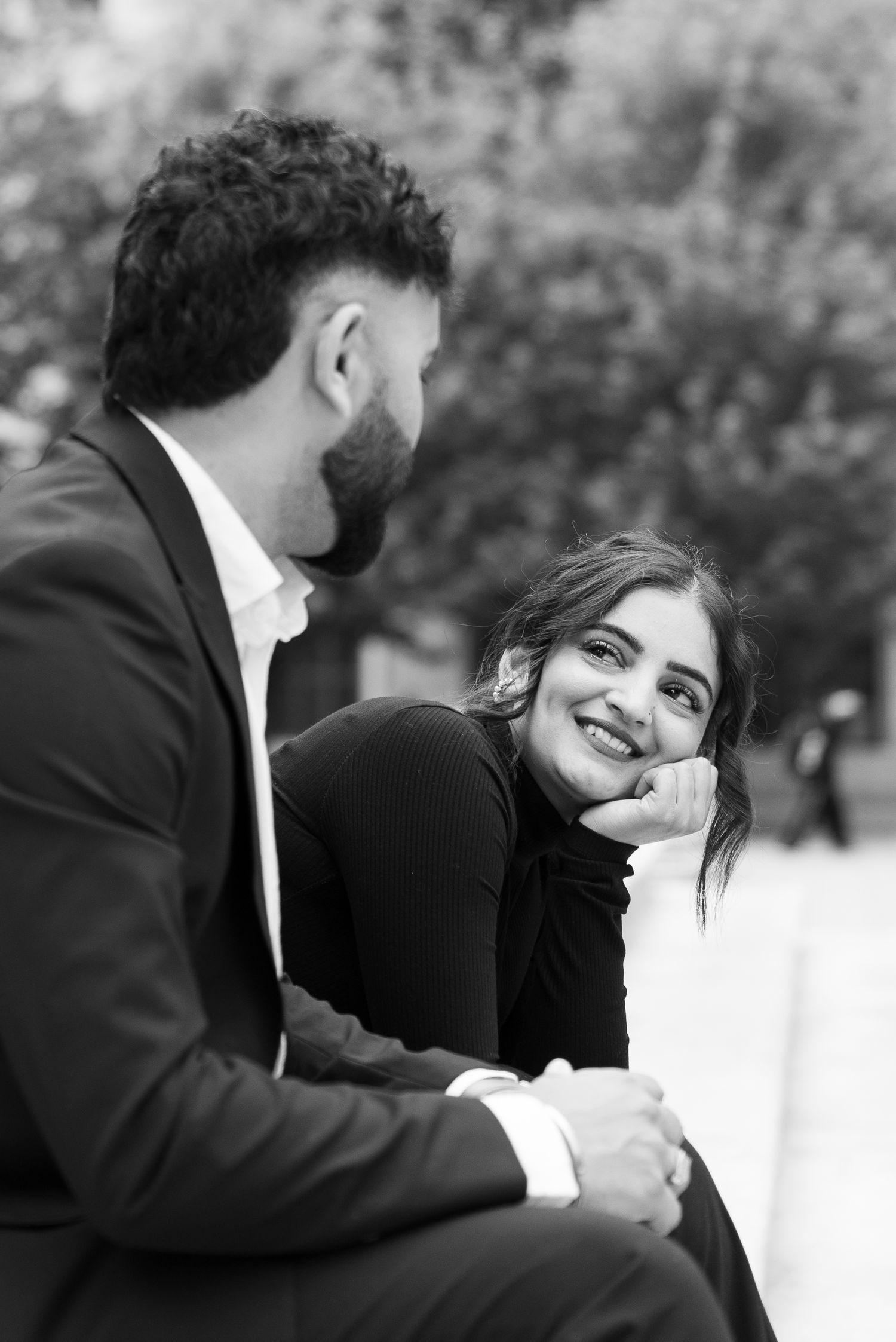 A black and white photo sequence showing tender moments between a couple.