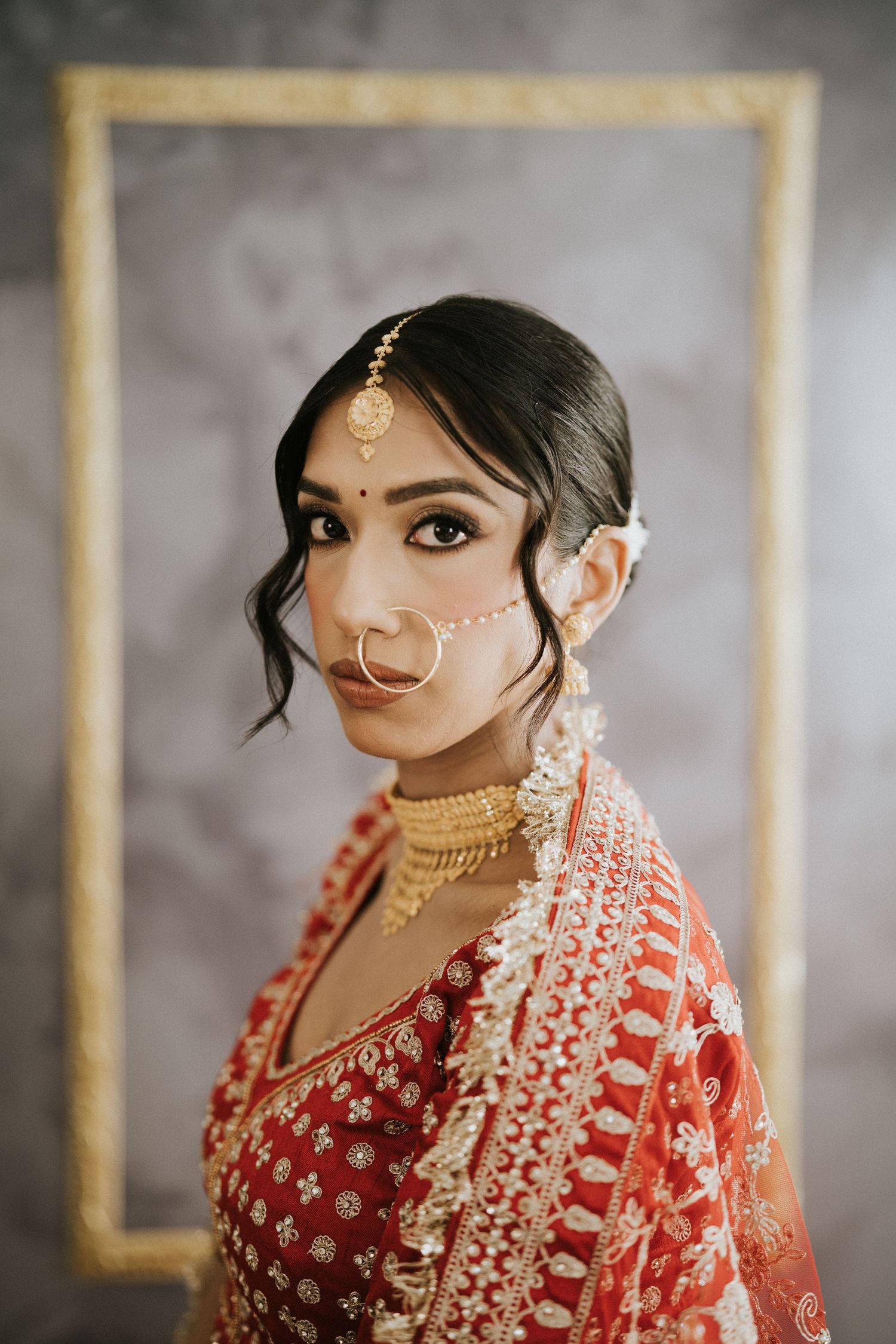 Close-up portrait shots showcasing traditional South Asian bridal jewelry and makeup.