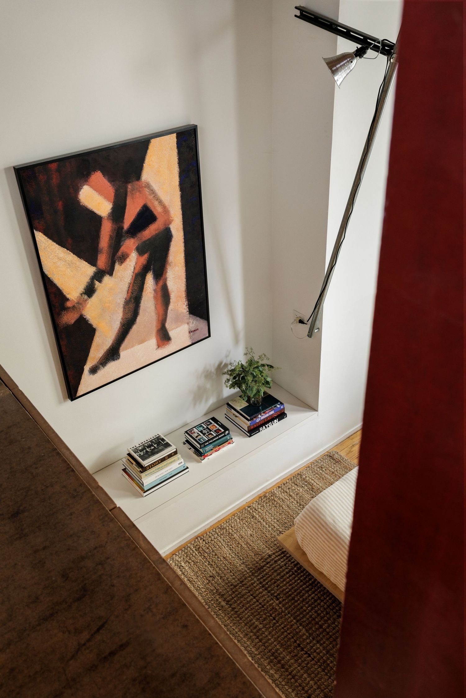 A series of five photos showing a decorative wall niche with books and a plant in a modern interior space.