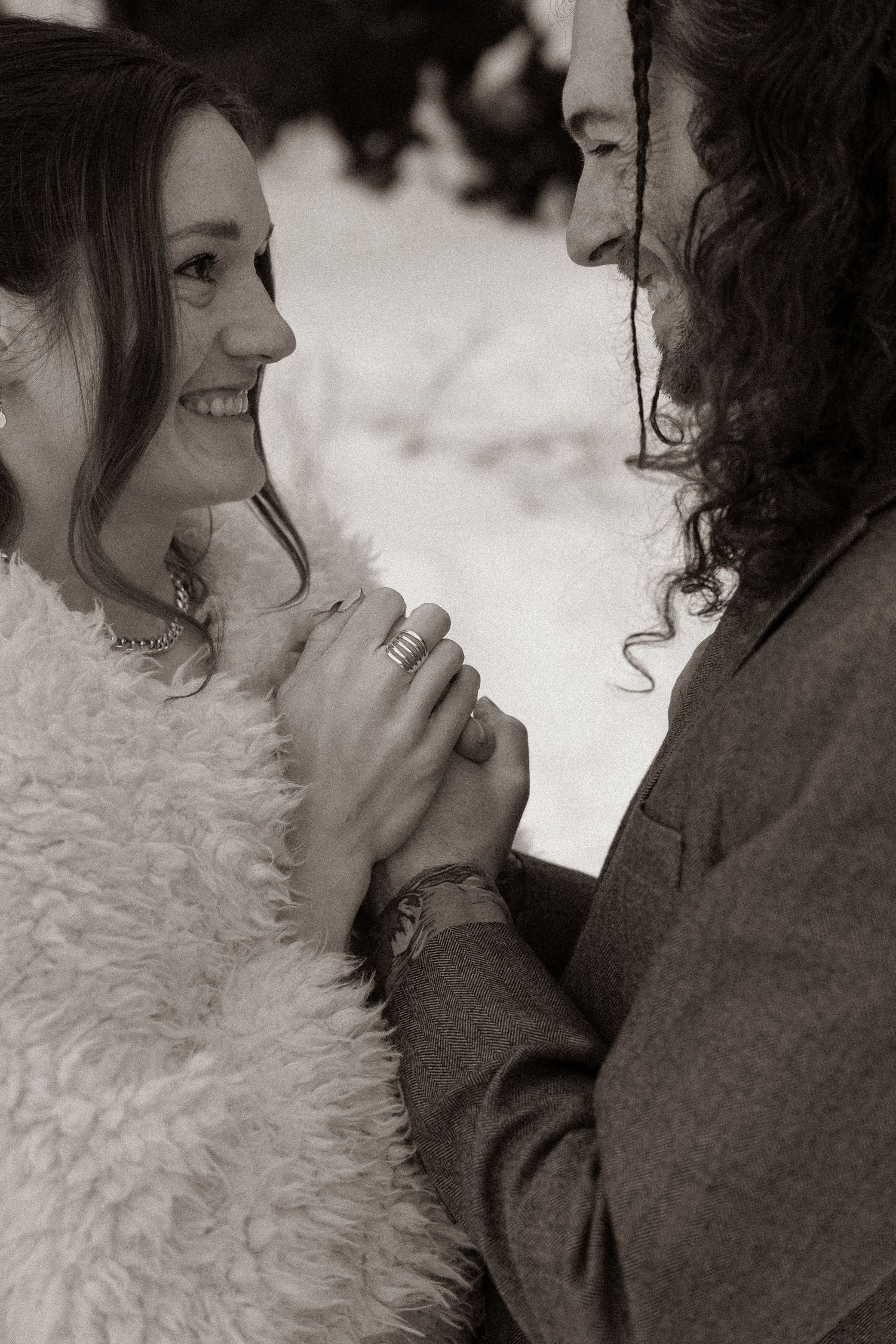 Intimate black and white portrait sequence showing tender moments.