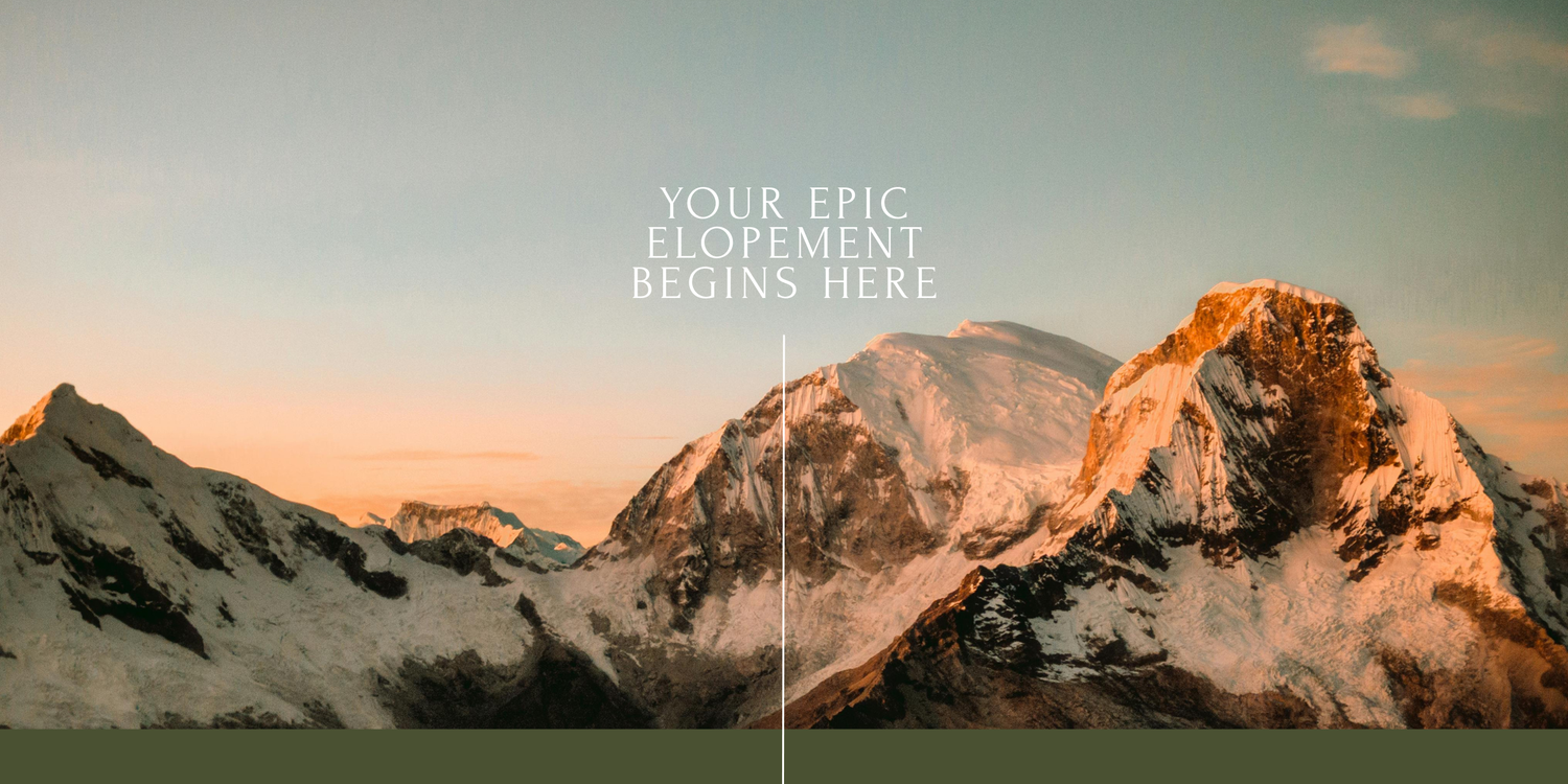 A panoramic mountain landscape at sunset shows snow-capped peaks and rugged terrain glowing in warm golden light.